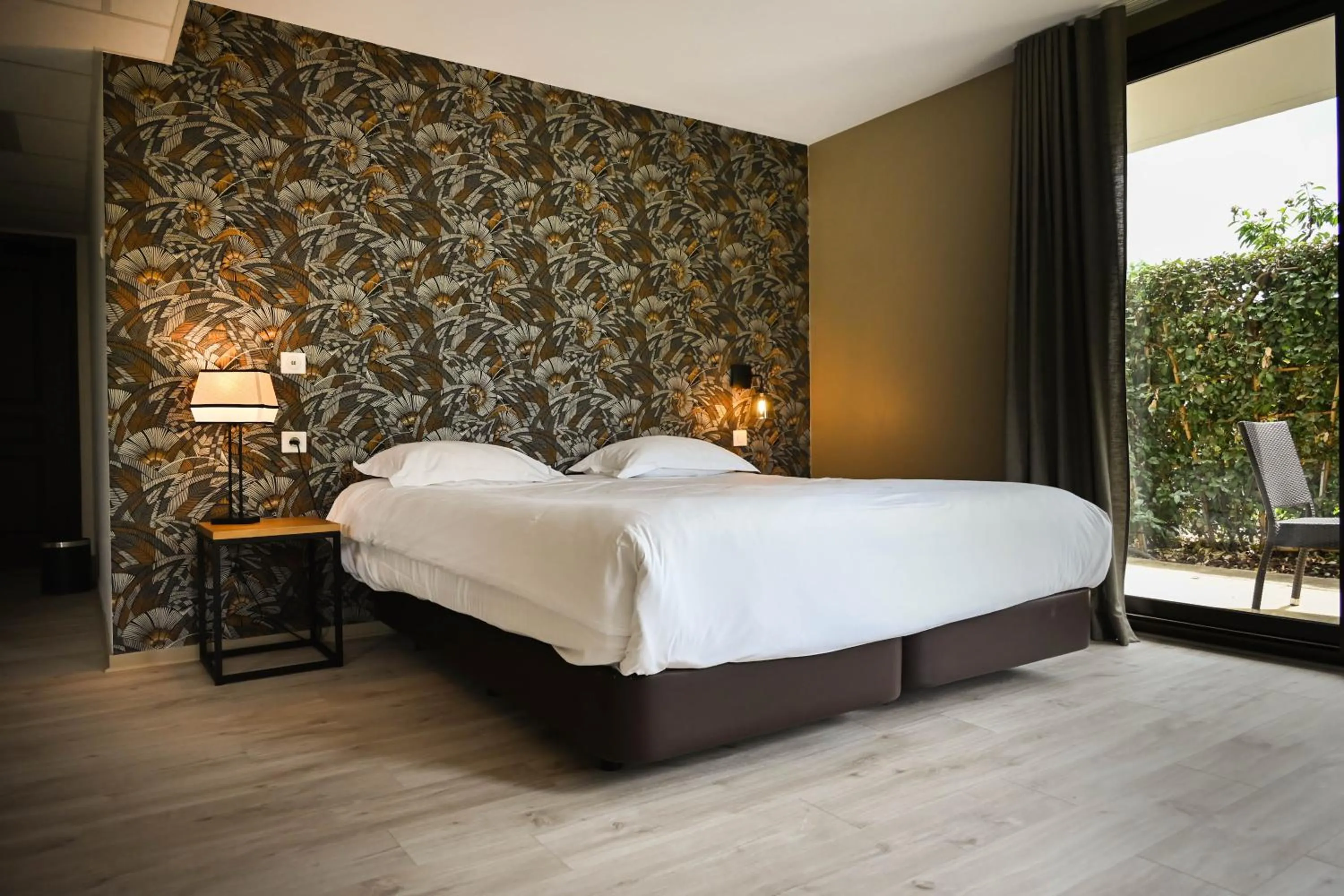 Bed in Hôtel Les Muses