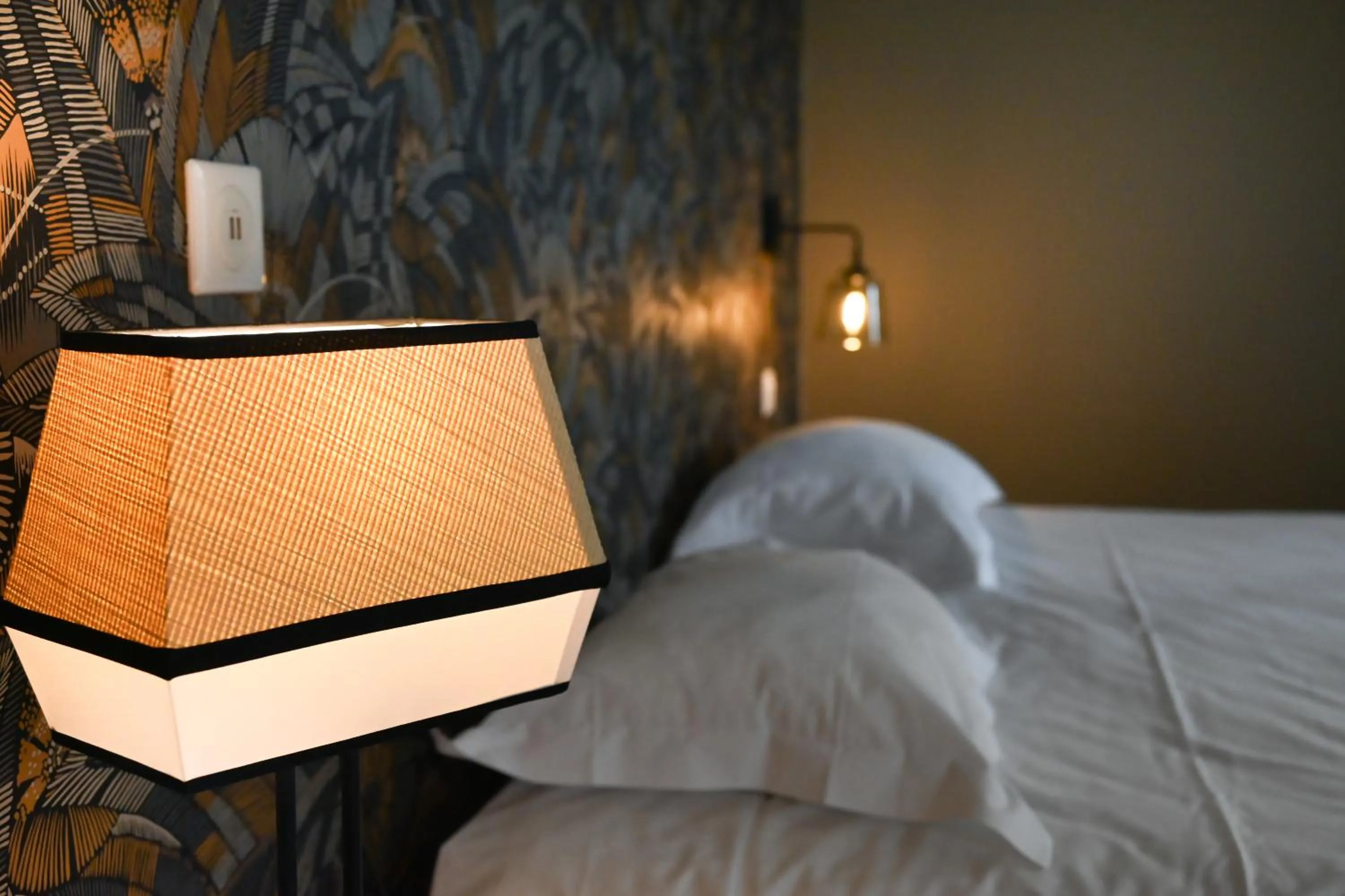 Bed in Hôtel Les Muses