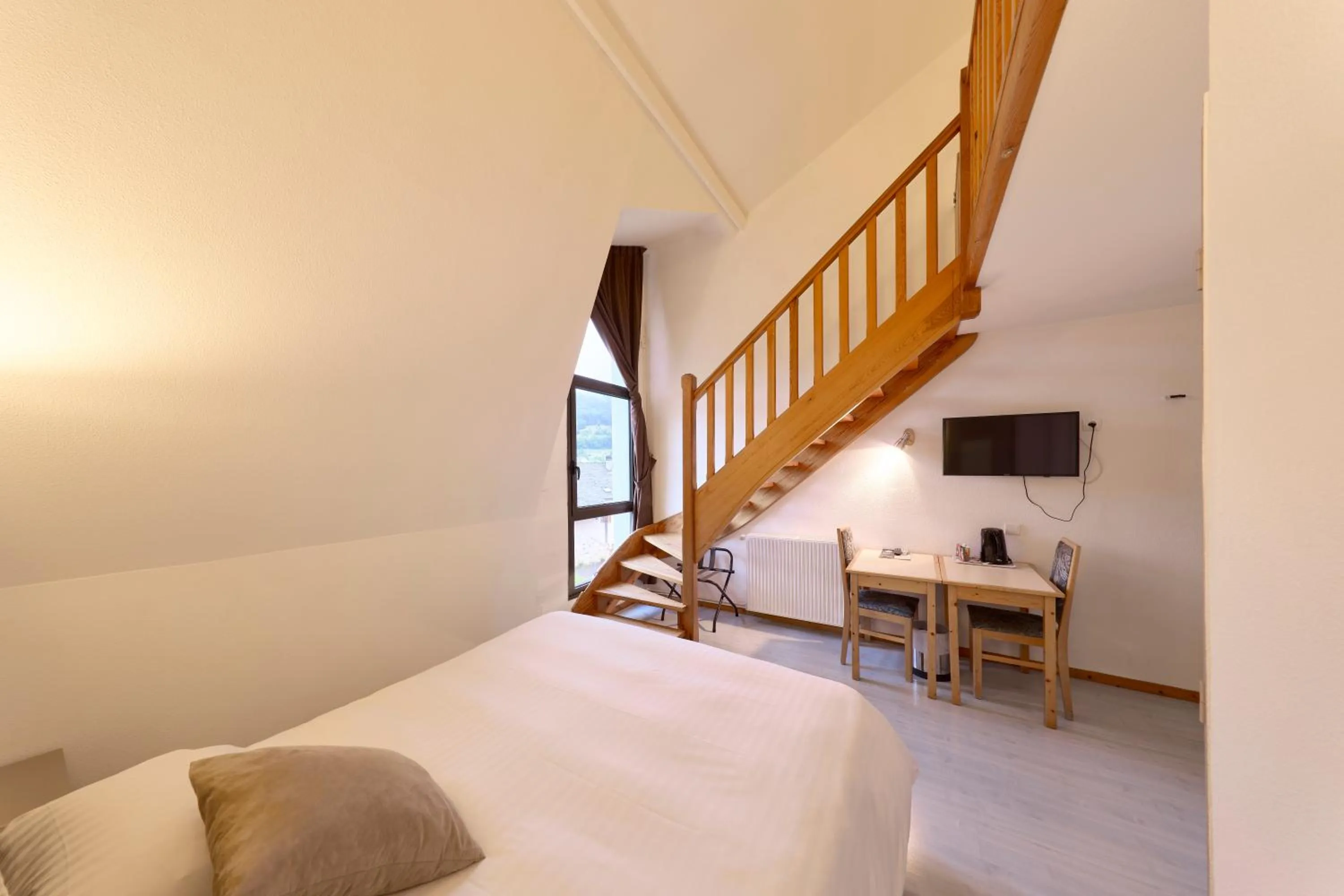 Bedroom, Bed in Hôtel-Restaurant Le Calice Du Gevaudan - A75