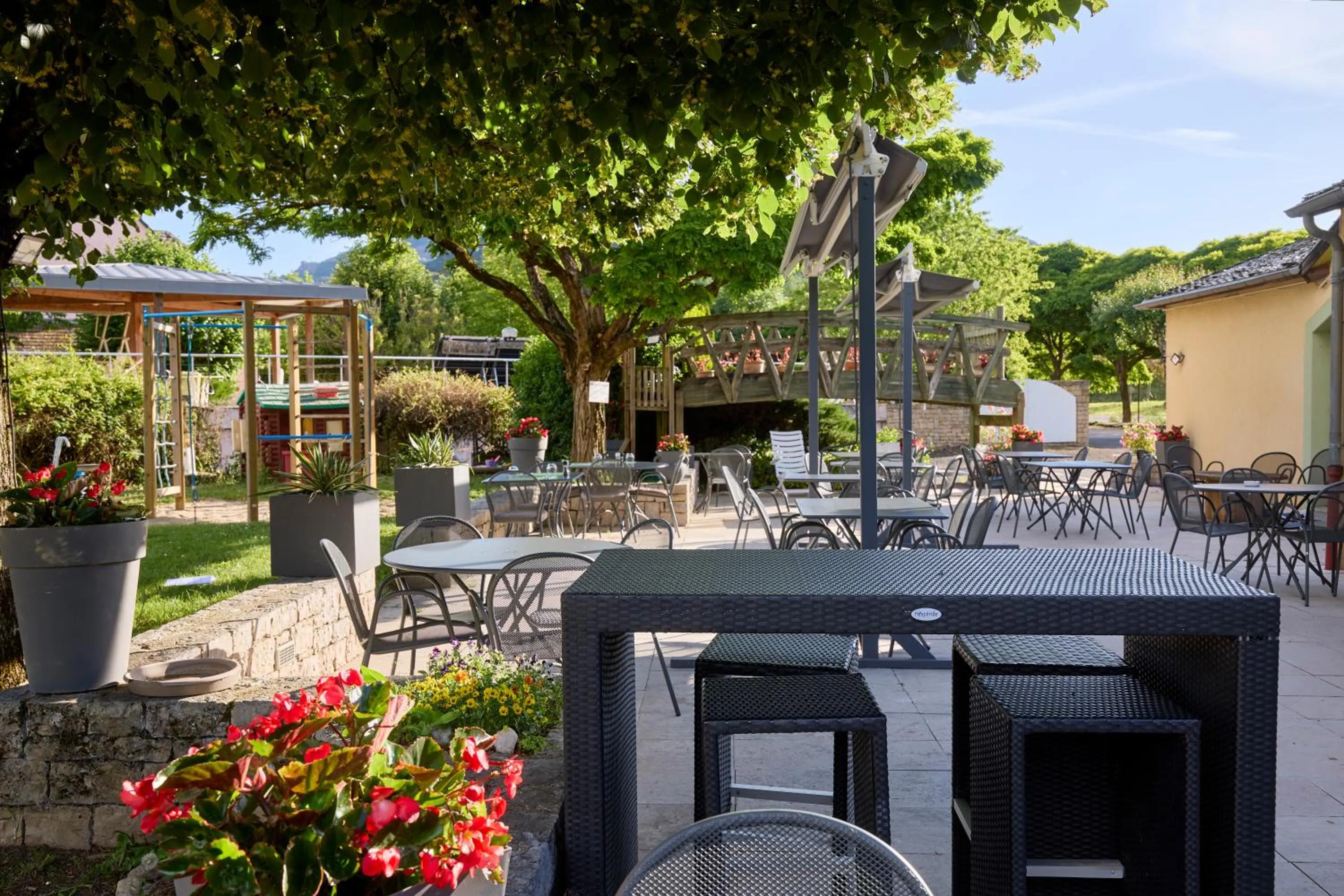 Patio in Hôtel-Restaurant Le Calice Du Gevaudan - A75