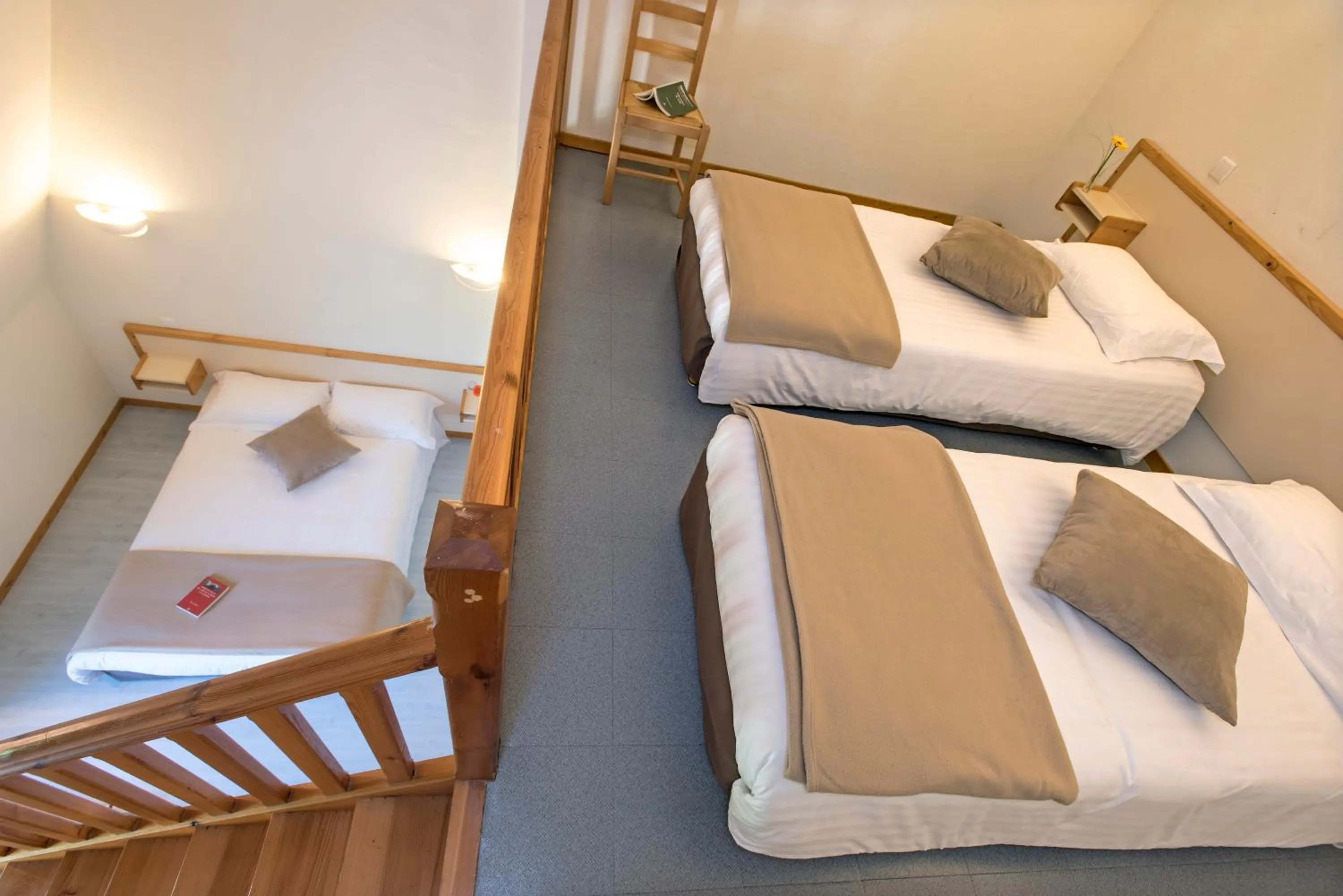 Photo of the whole room, Bed in Hôtel-Restaurant Le Calice Du Gevaudan - A75