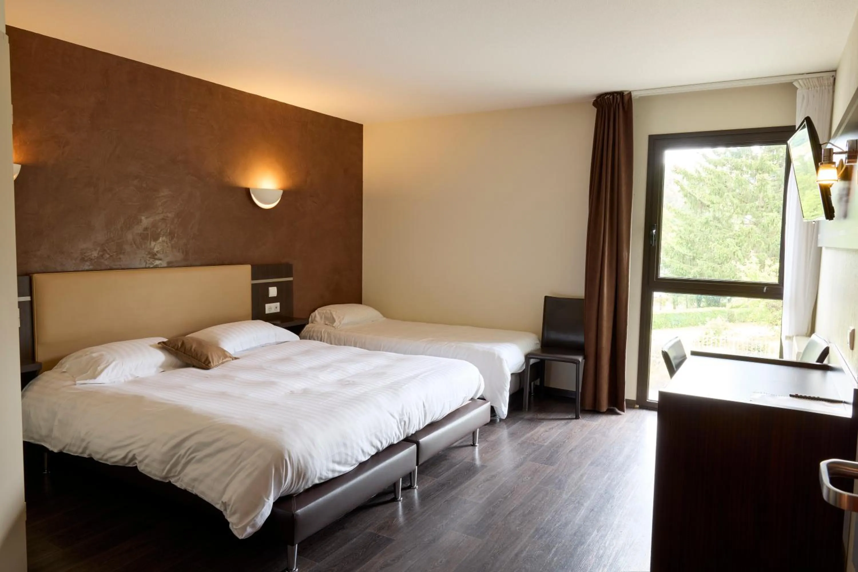 Bedroom, Bed in Hôtel-Restaurant Le Calice Du Gevaudan - A75