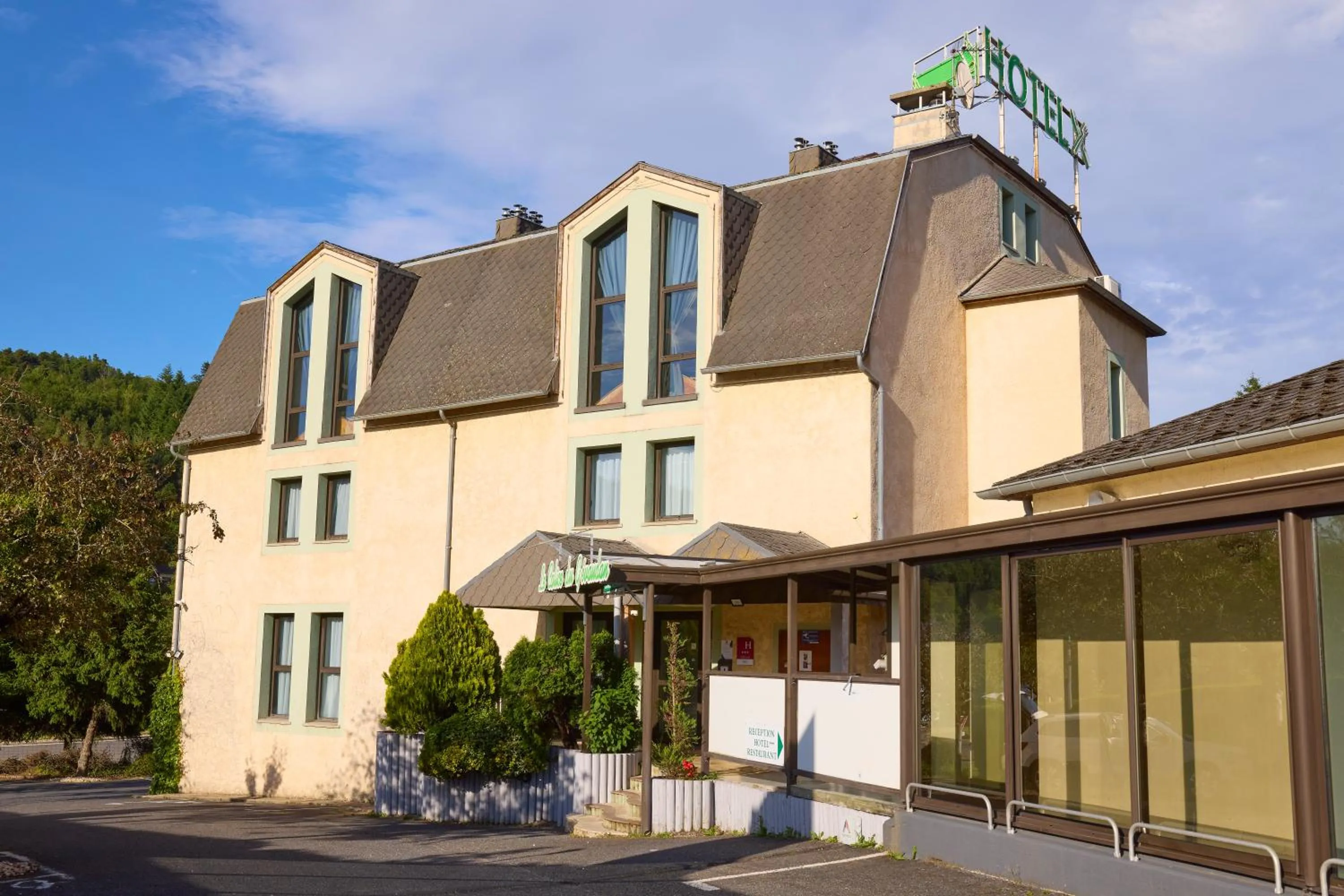 Property building in Hôtel-Restaurant Le Calice Du Gevaudan - A75