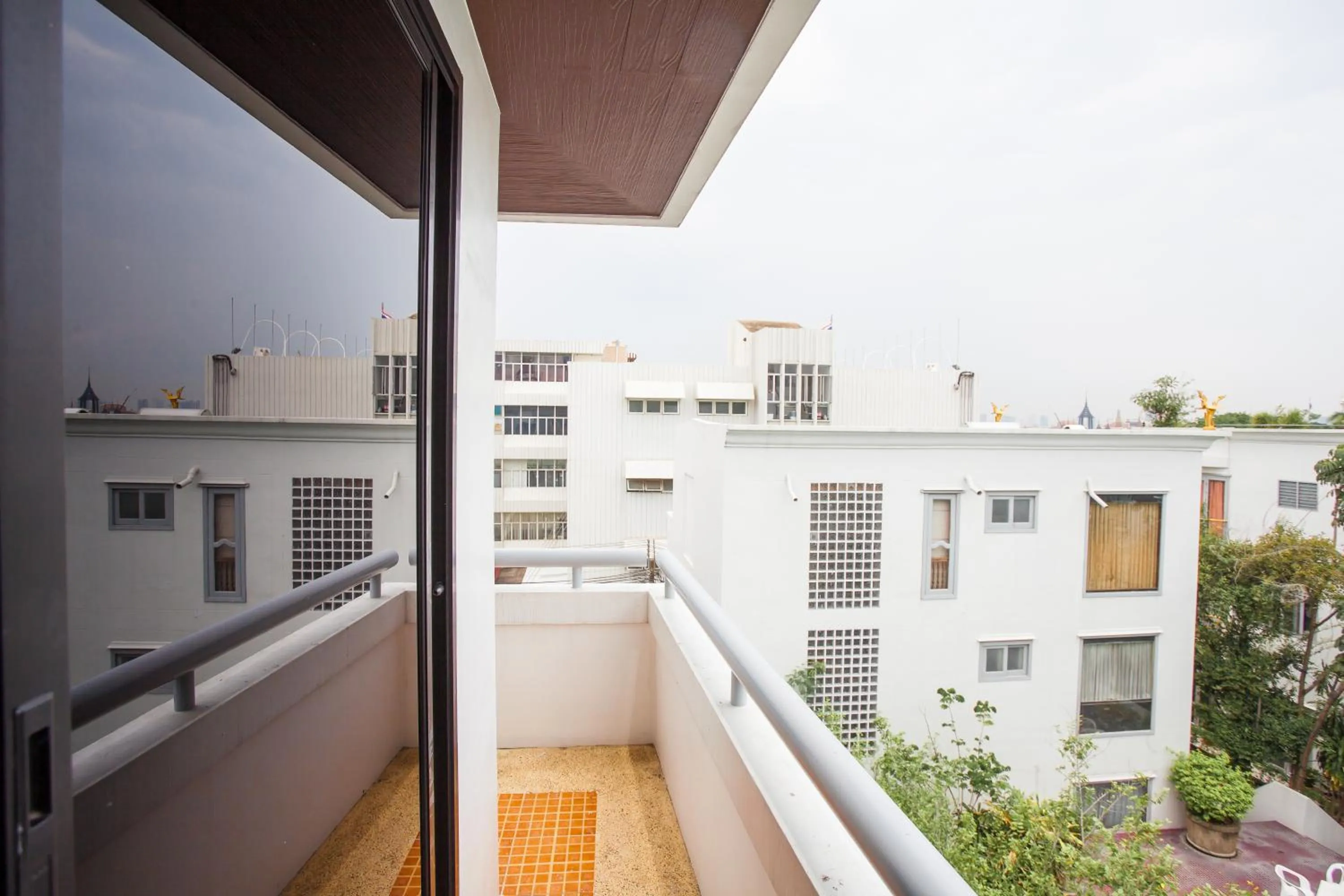 Property building in New Siam Palace Ville Hotel