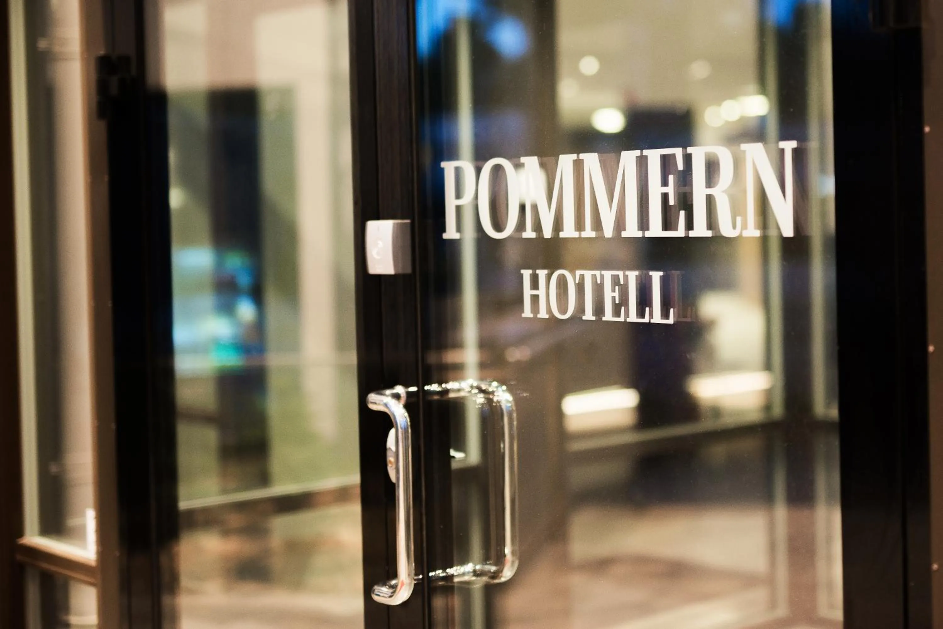 Property logo or sign in Hotel Pommern