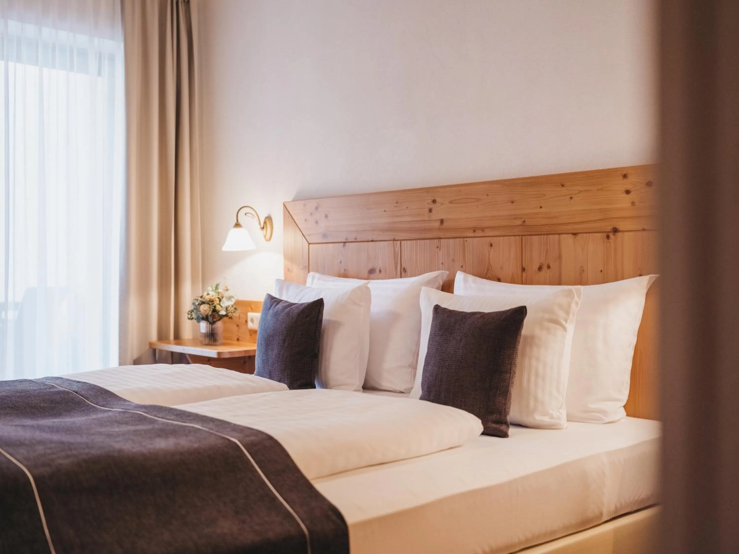 Bedroom in Hotel Vier Jahreszeiten by VAYA