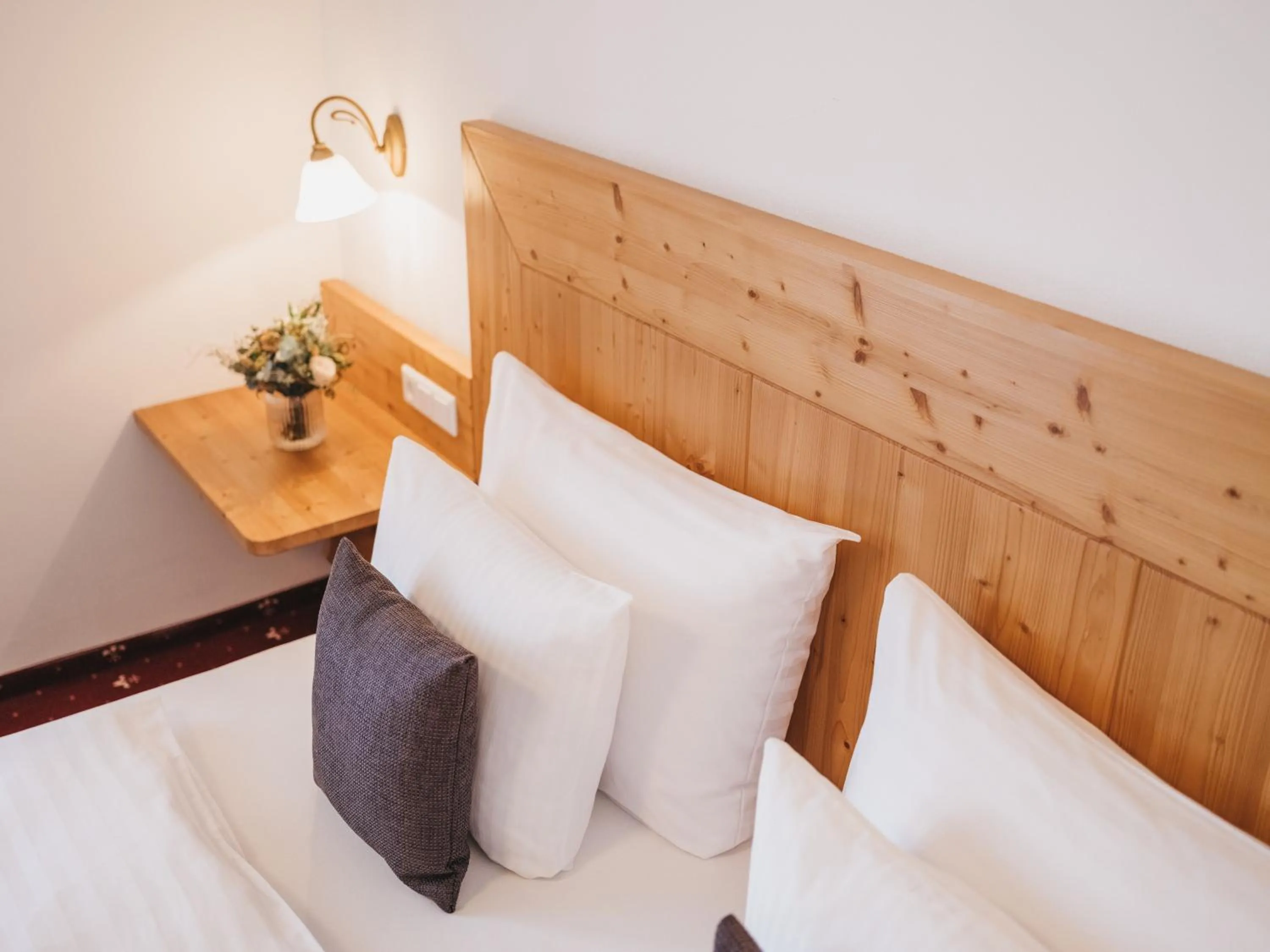 Bedroom in Hotel Vier Jahreszeiten by VAYA