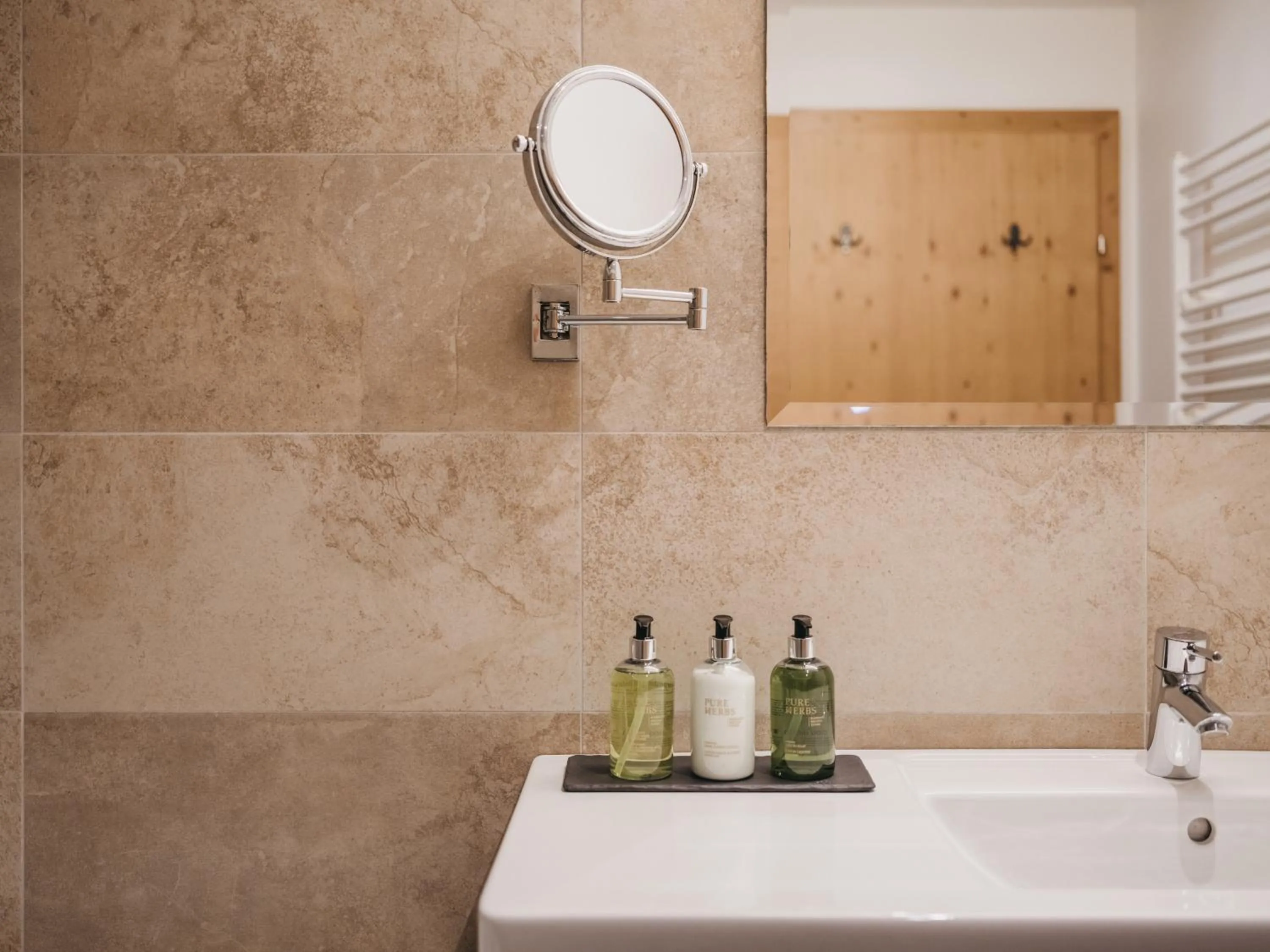 Bathroom in Hotel Vier Jahreszeiten by VAYA