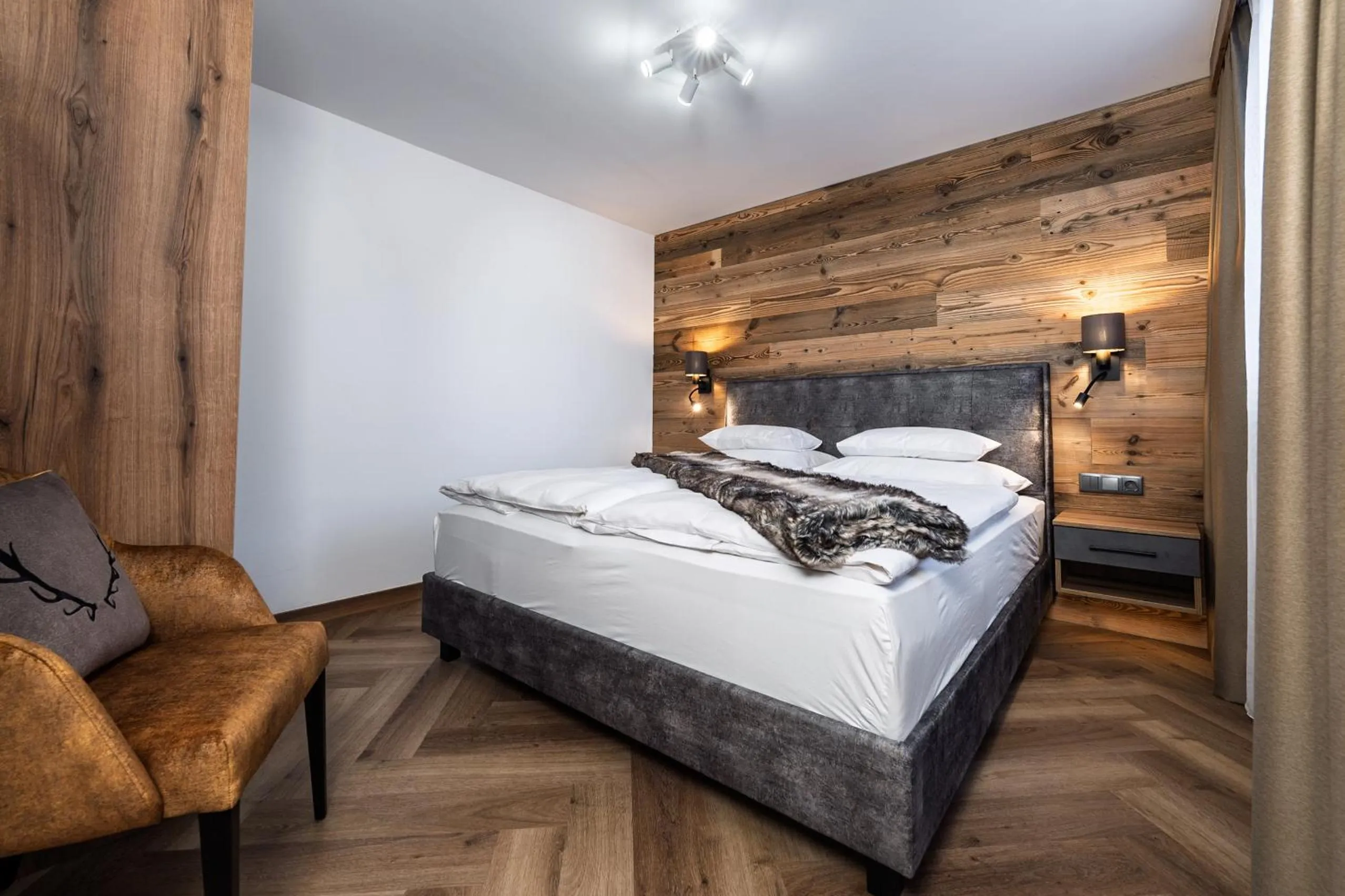 Bed in Hotel Vier Jahreszeiten