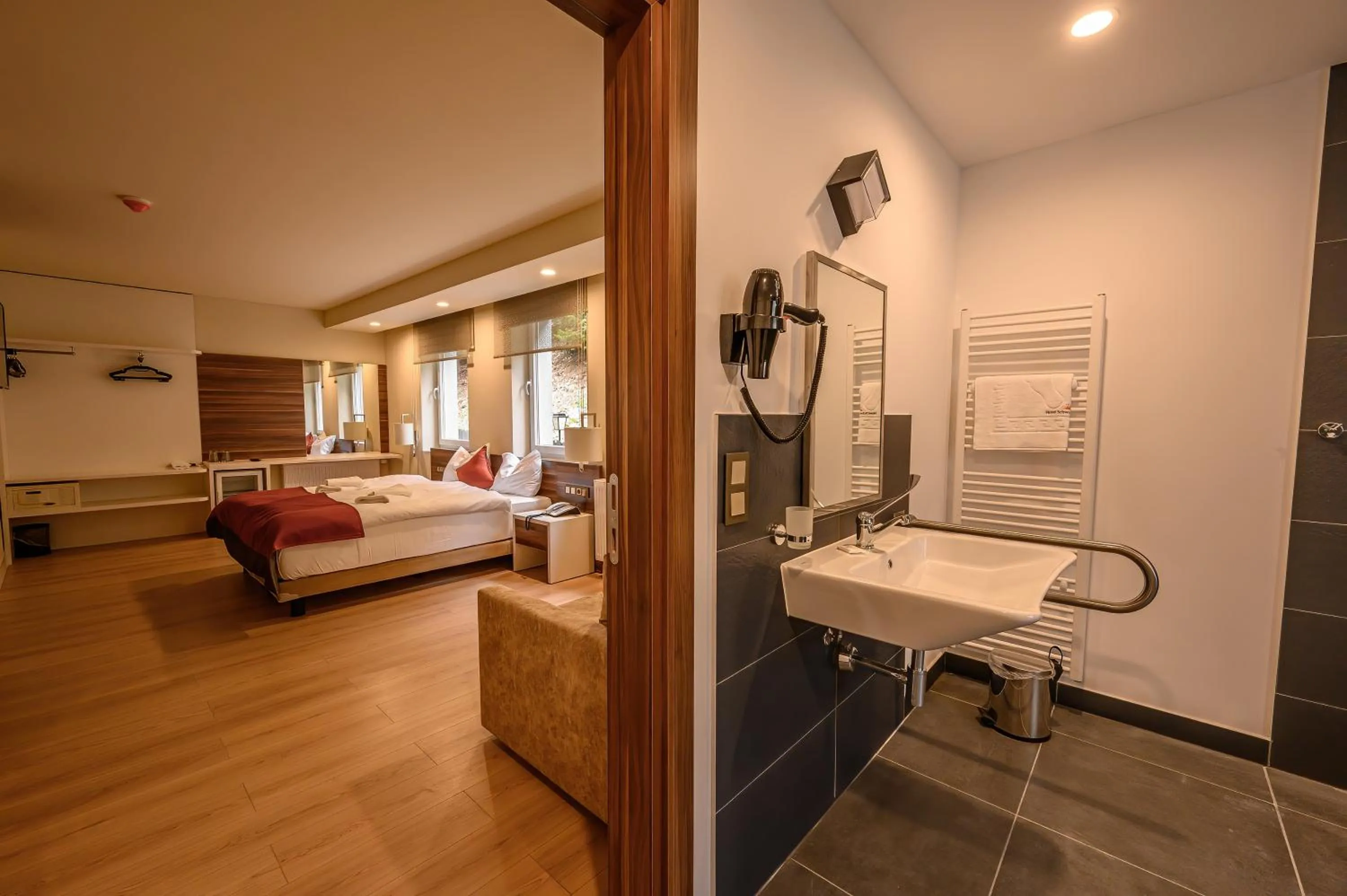 Photo of the whole room, Bed in Hotel Schwarzbachtal Hideaway