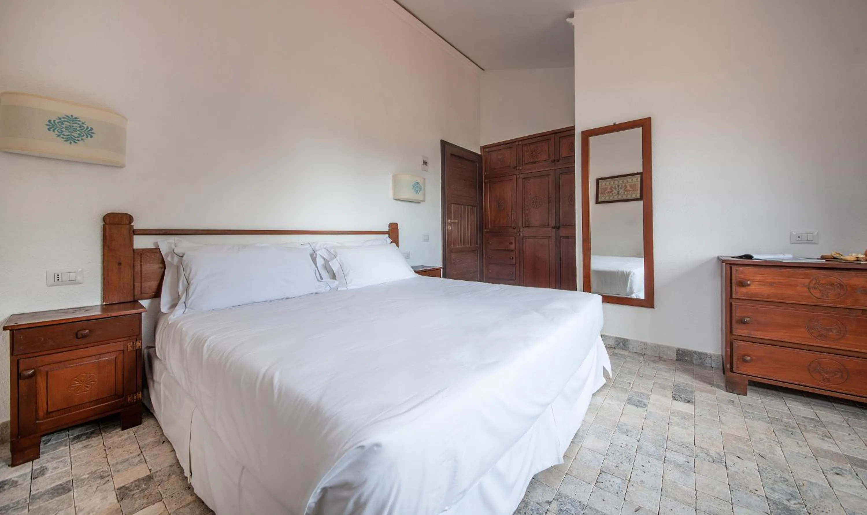 Photo of the whole room, Bed in Arbatax Park Resort - Borgo Cala Moresca
