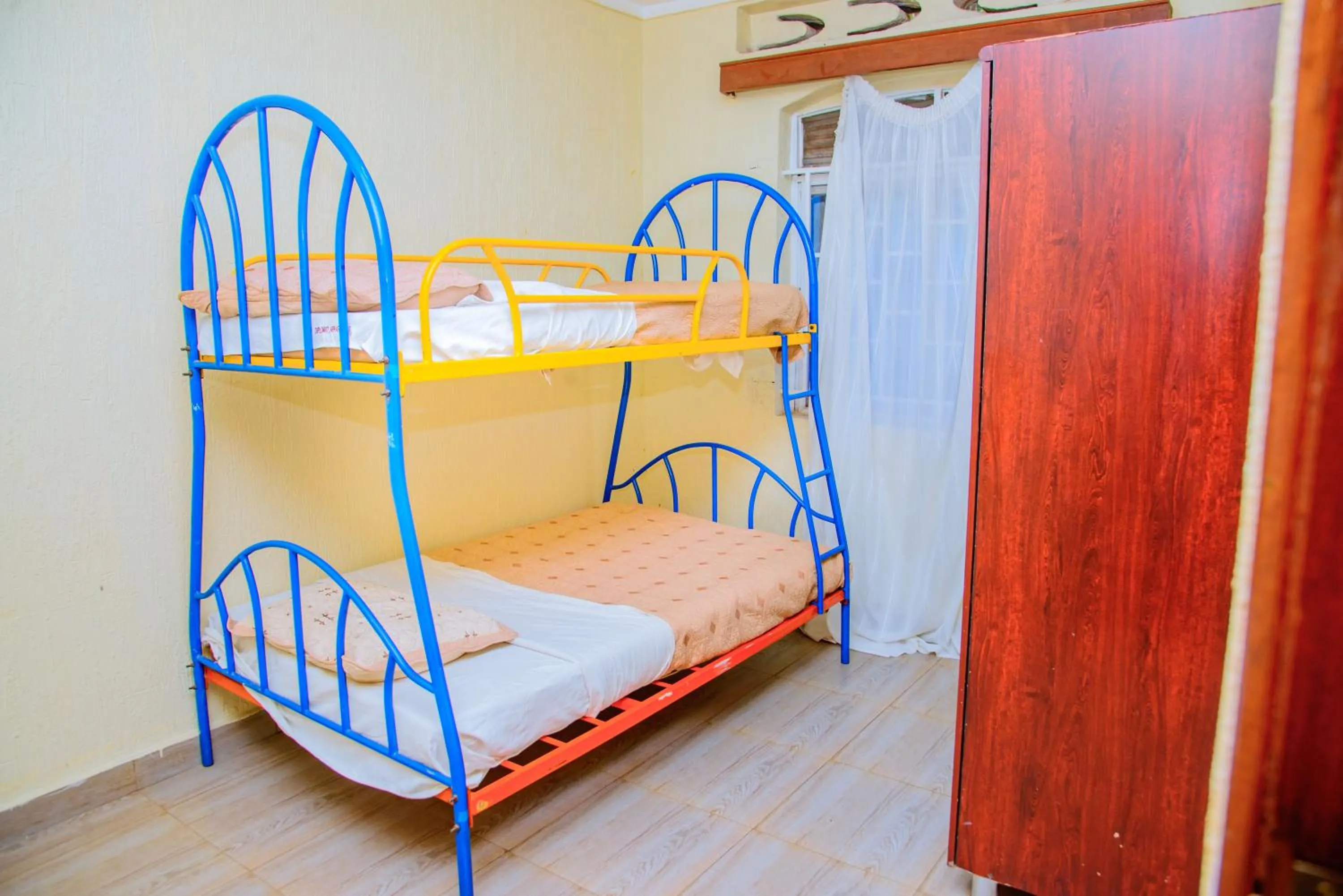 Bed in Diplomat Apartments