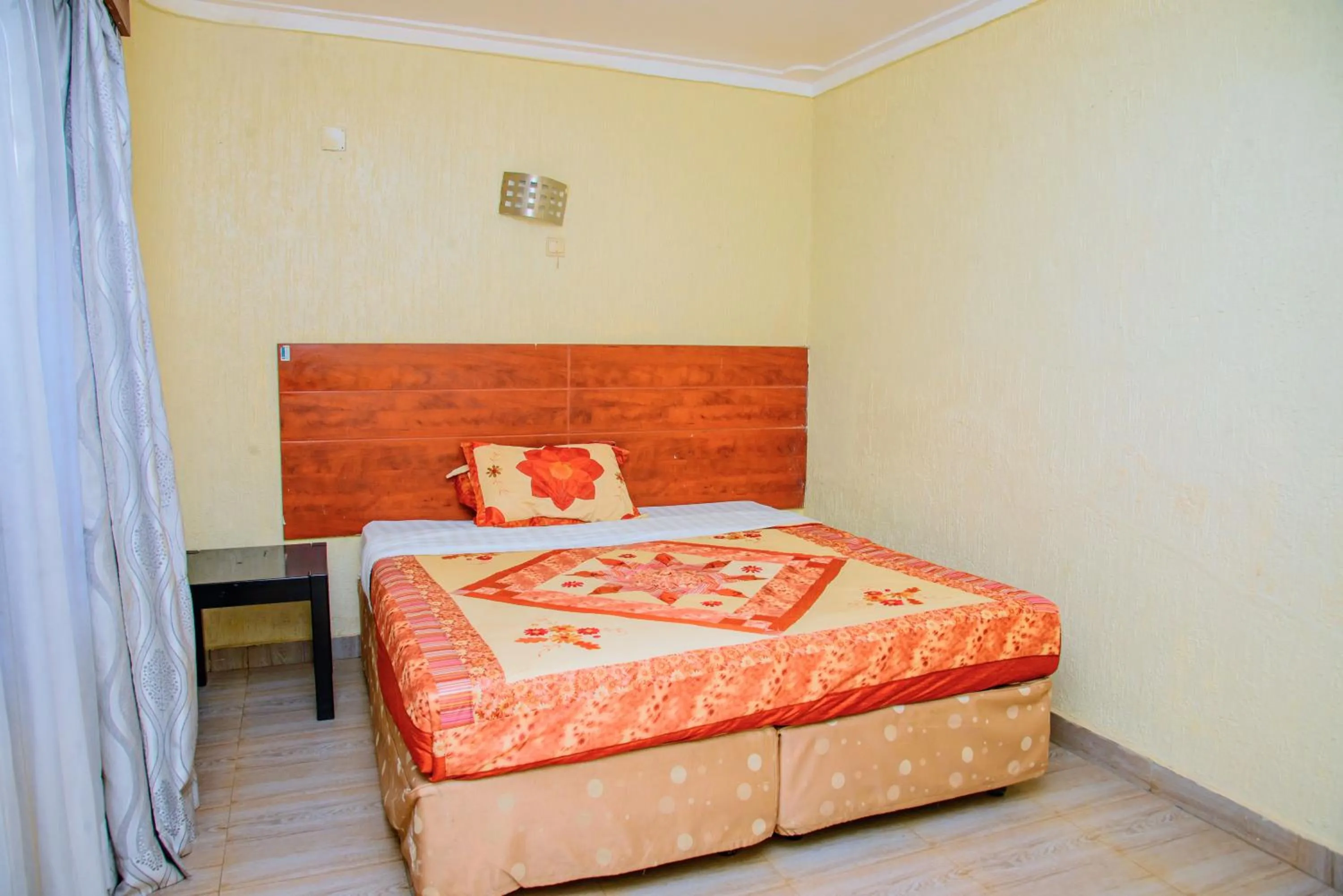 Bed in Diplomat Apartments
