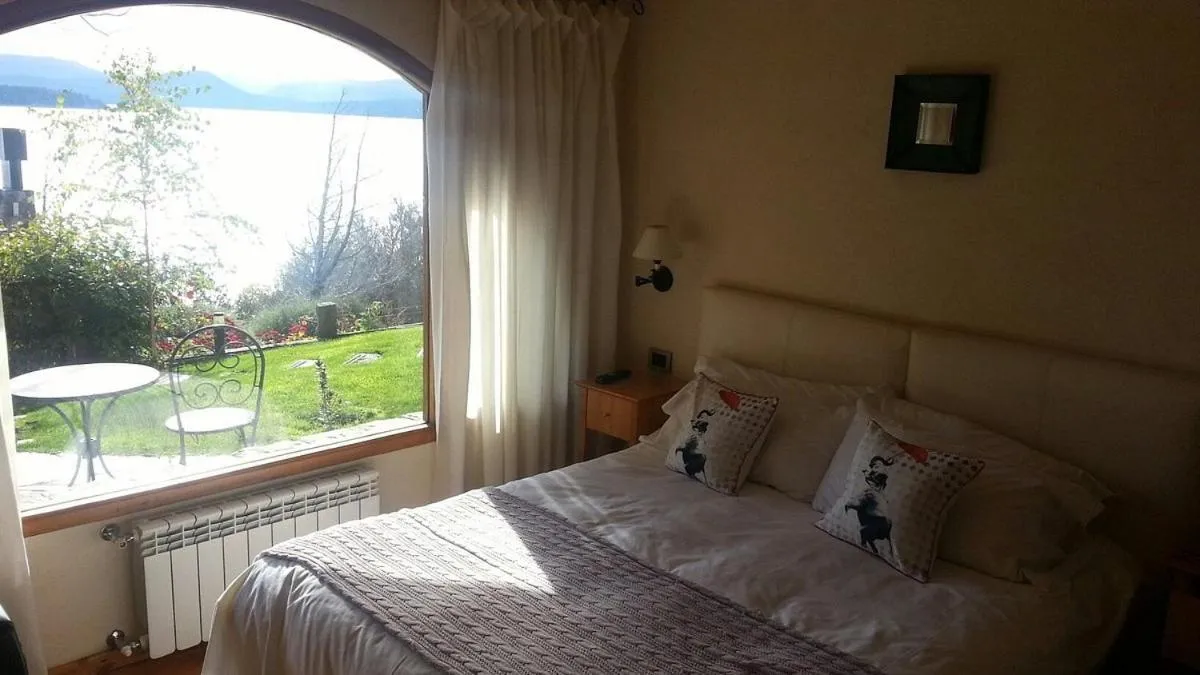 Bed in Lirolay Suites - Apart Hotel