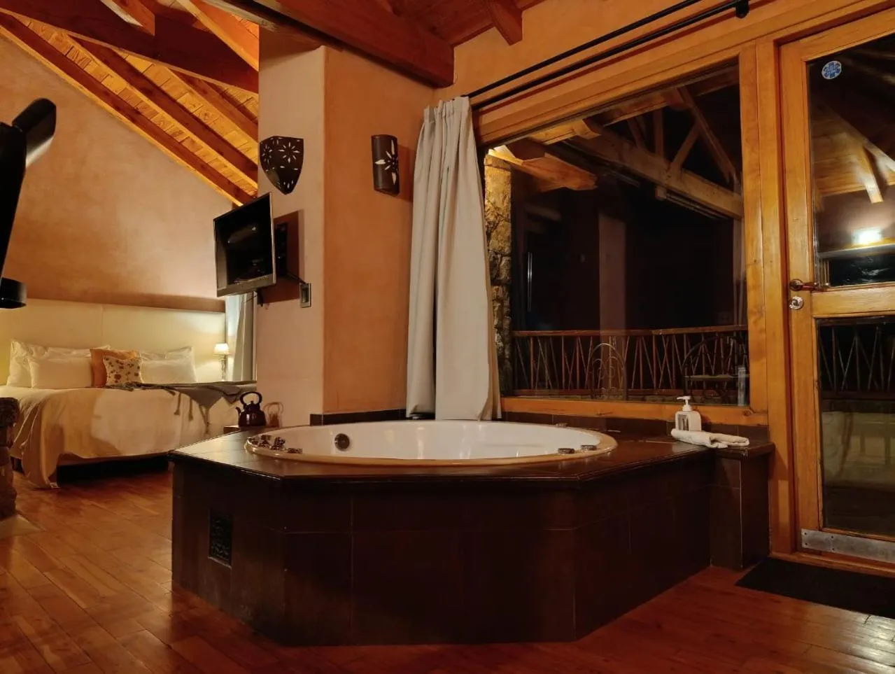 Bed in Lirolay Suites - Apart Hotel