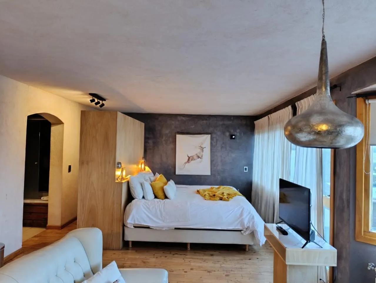 Bed in Lirolay Suites - Apart Hotel