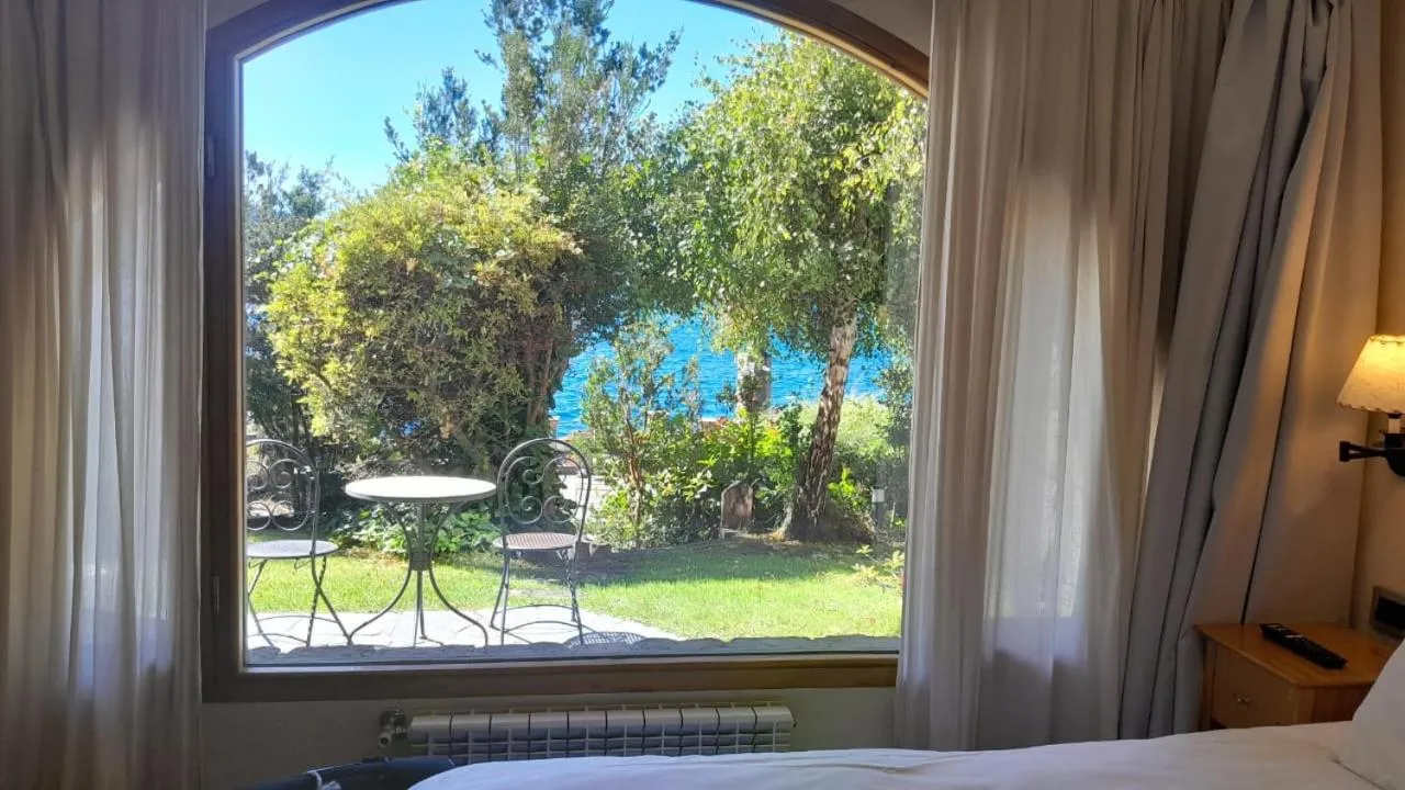 Bed in Lirolay Suites - Apart Hotel