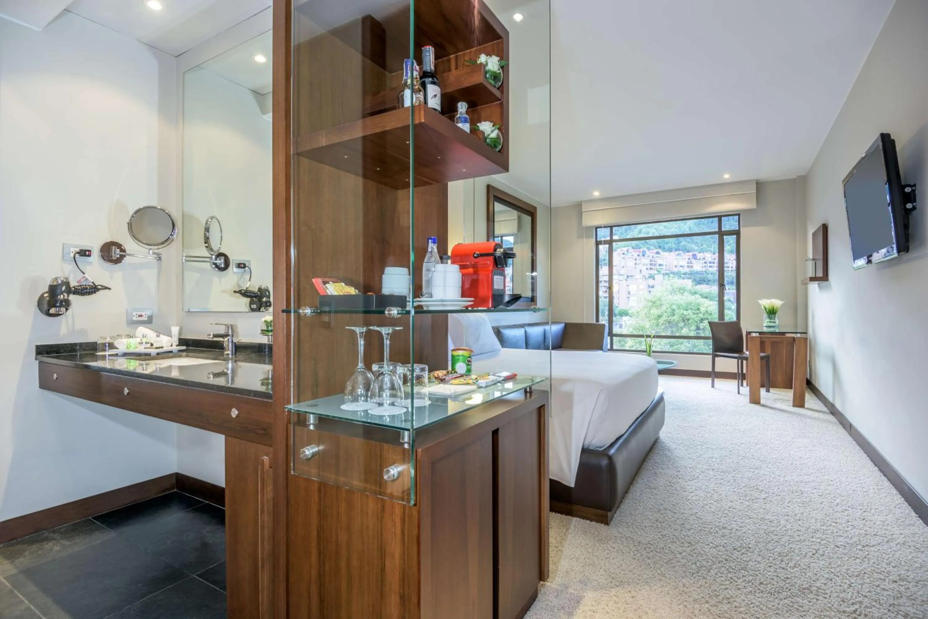 Photo of the whole room, Bed in NH Collection Bogota Hacienda Royal