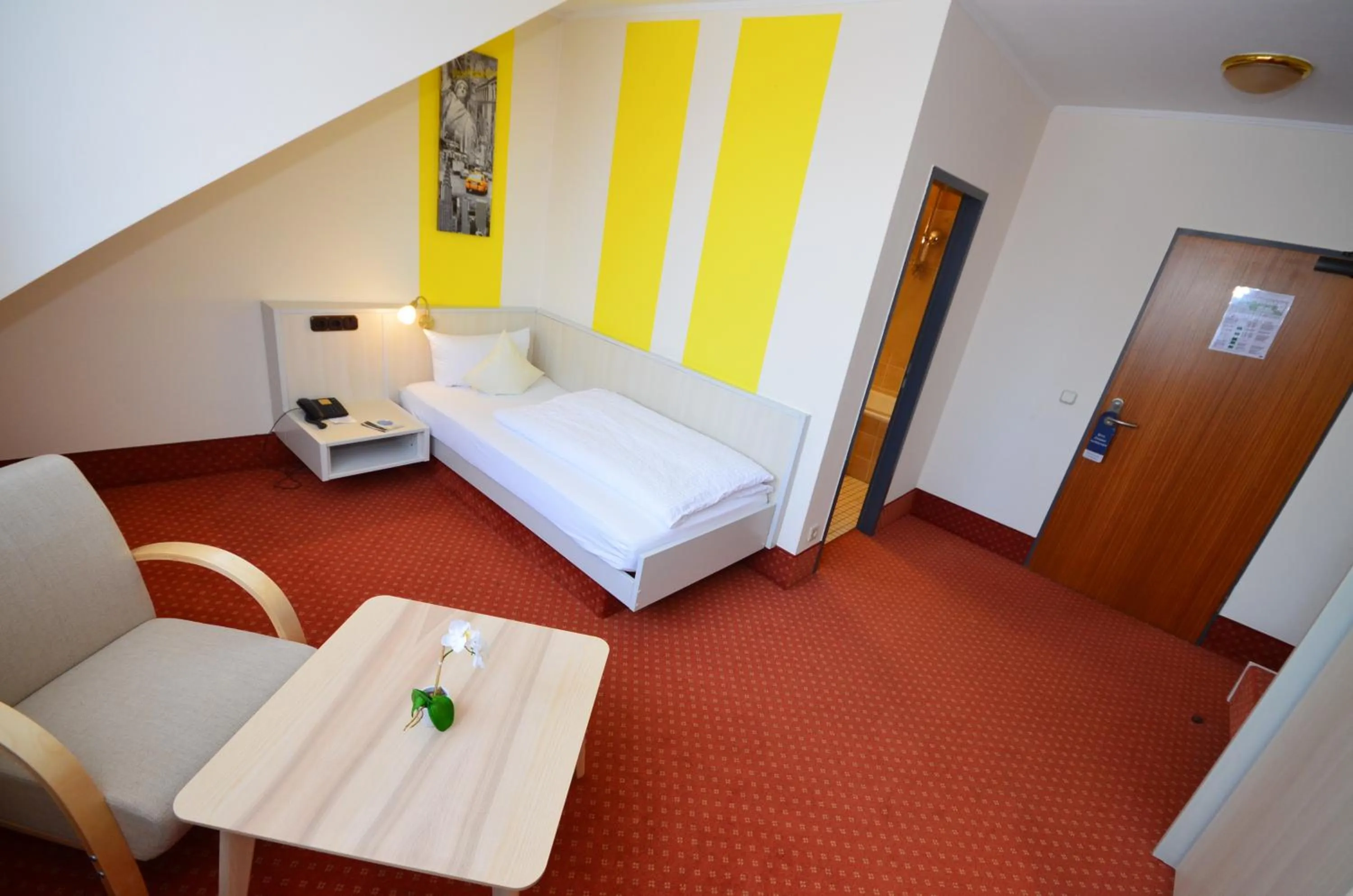 Photo of the whole room, Bed in CityHotel Uelzen