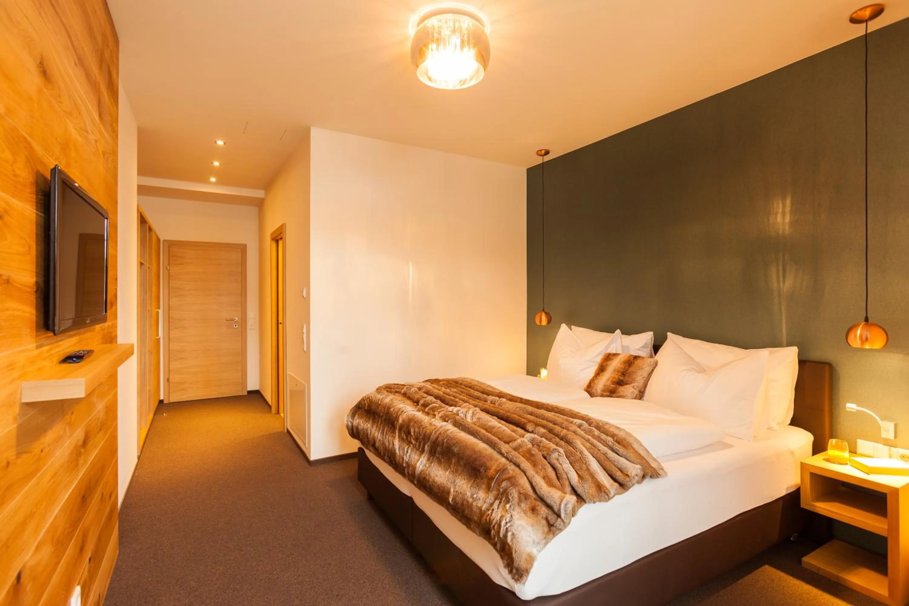 Bed in LEDERER Boutique Hotel