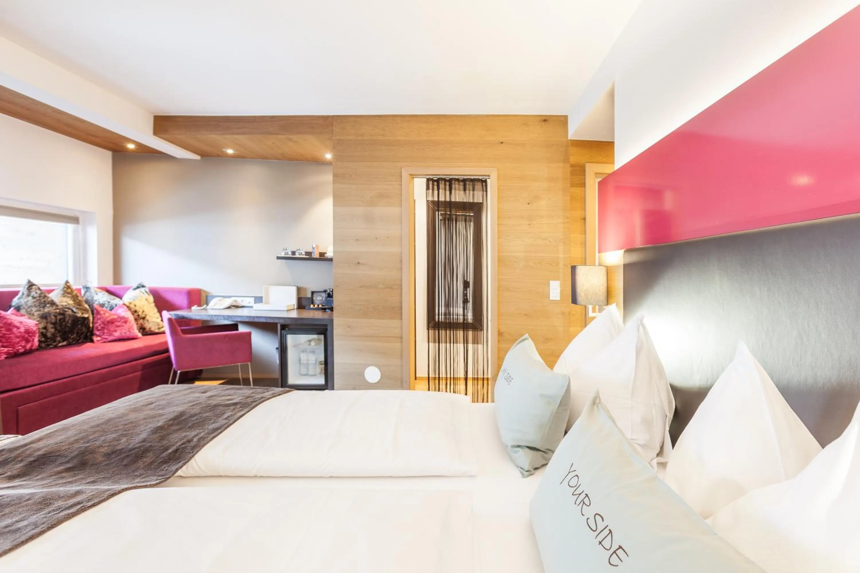 Bed in LEDERER Boutique Hotel