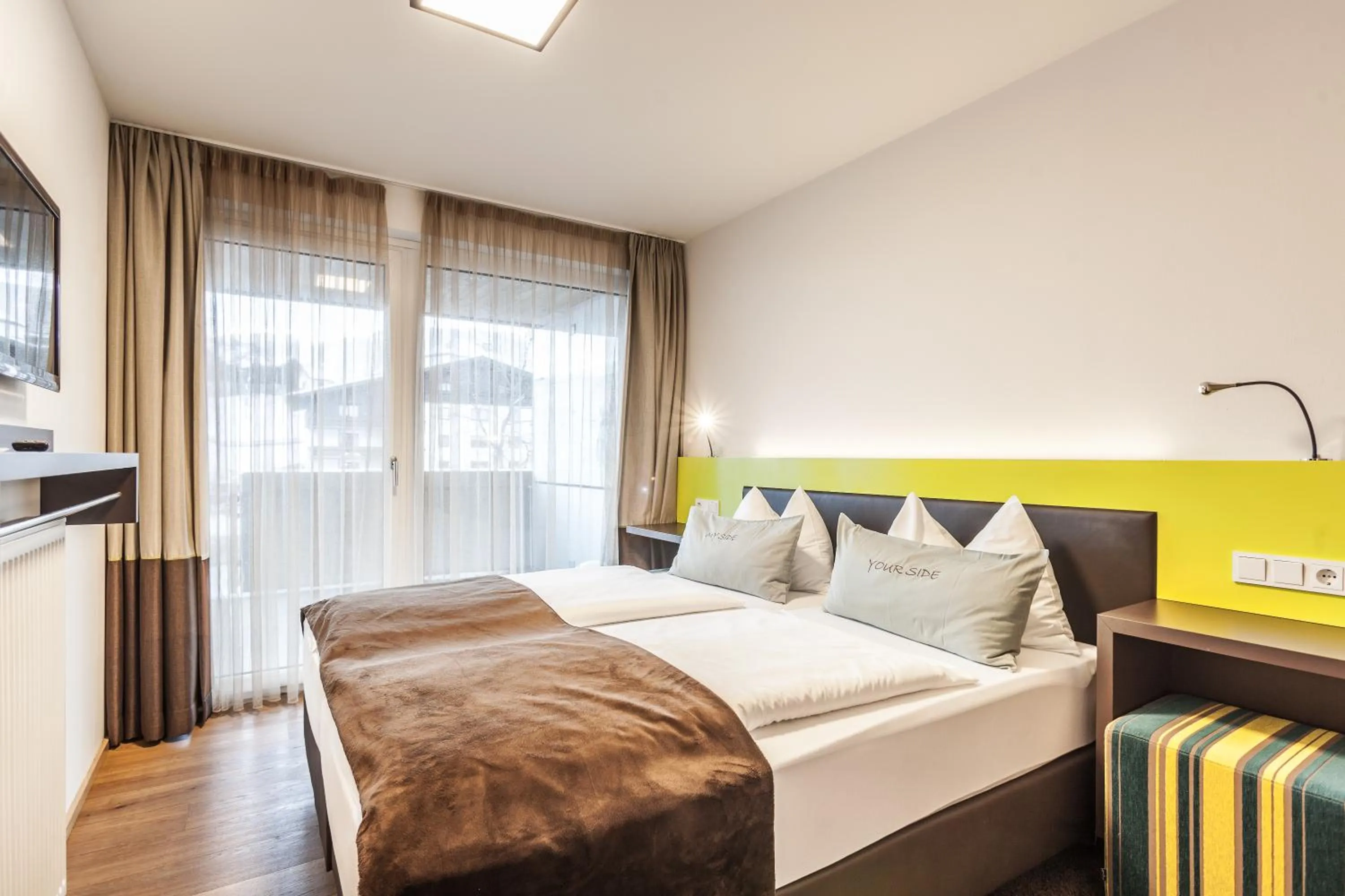 Bed in LEDERER Boutique Hotel