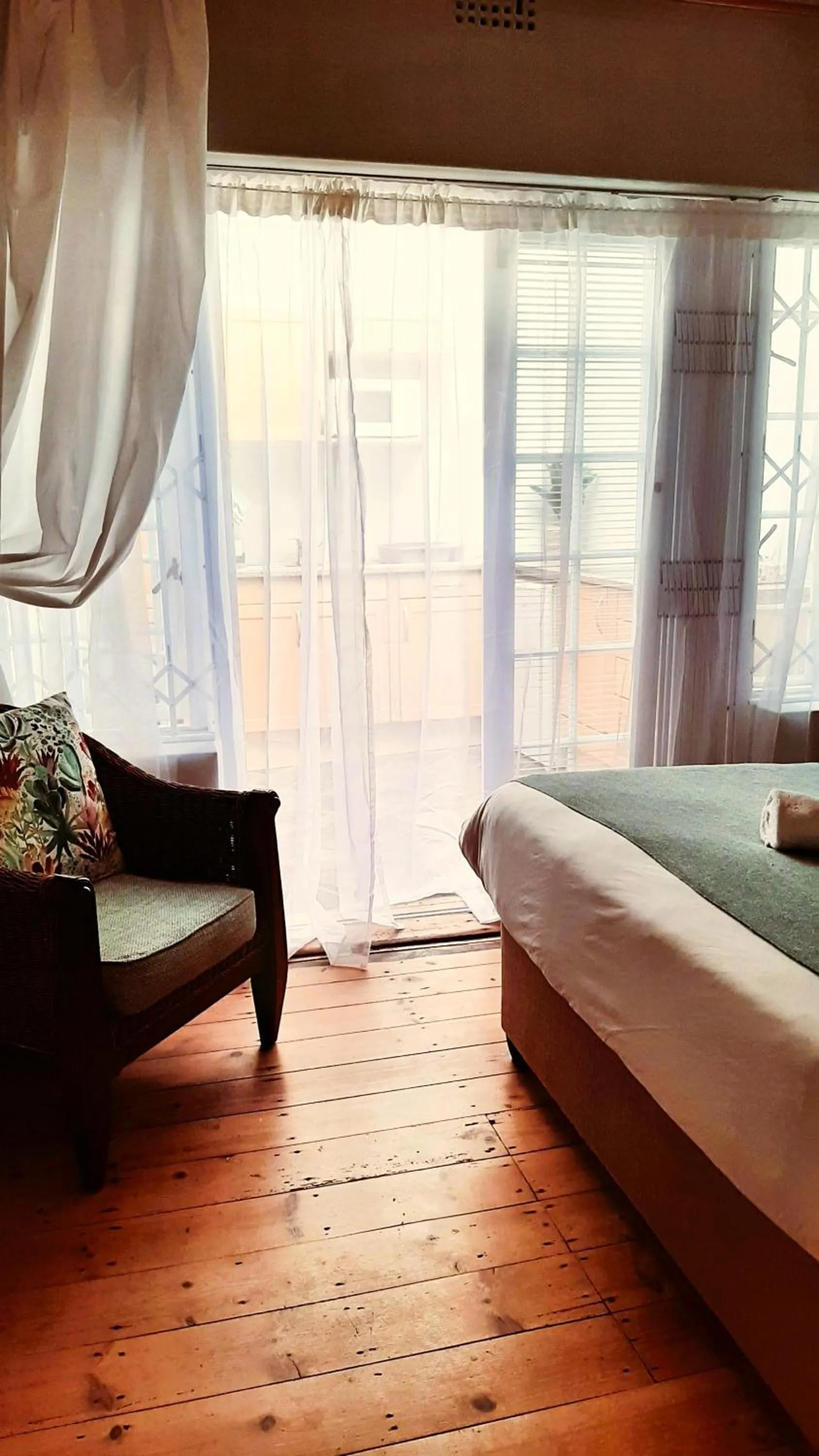 Seating area, Bed in The Greenhouse Guesthouse