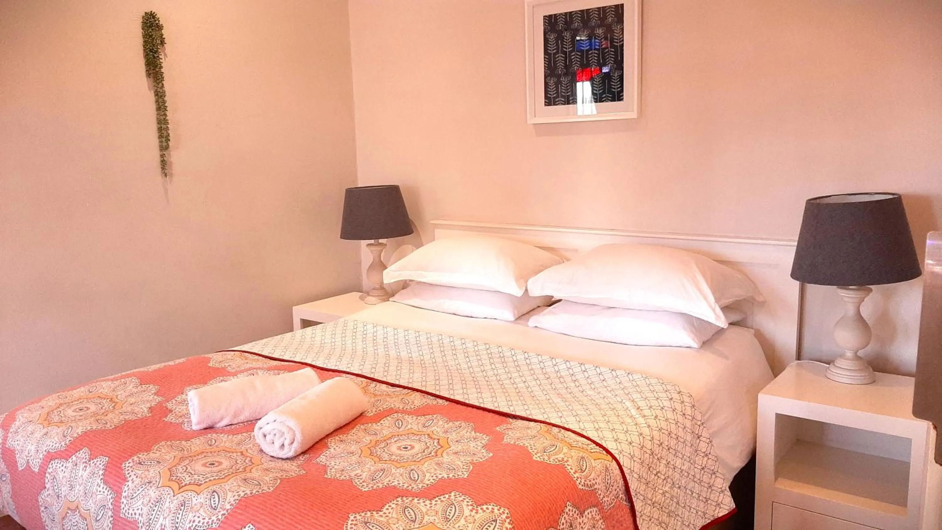 Bed in The Greenhouse Guesthouse