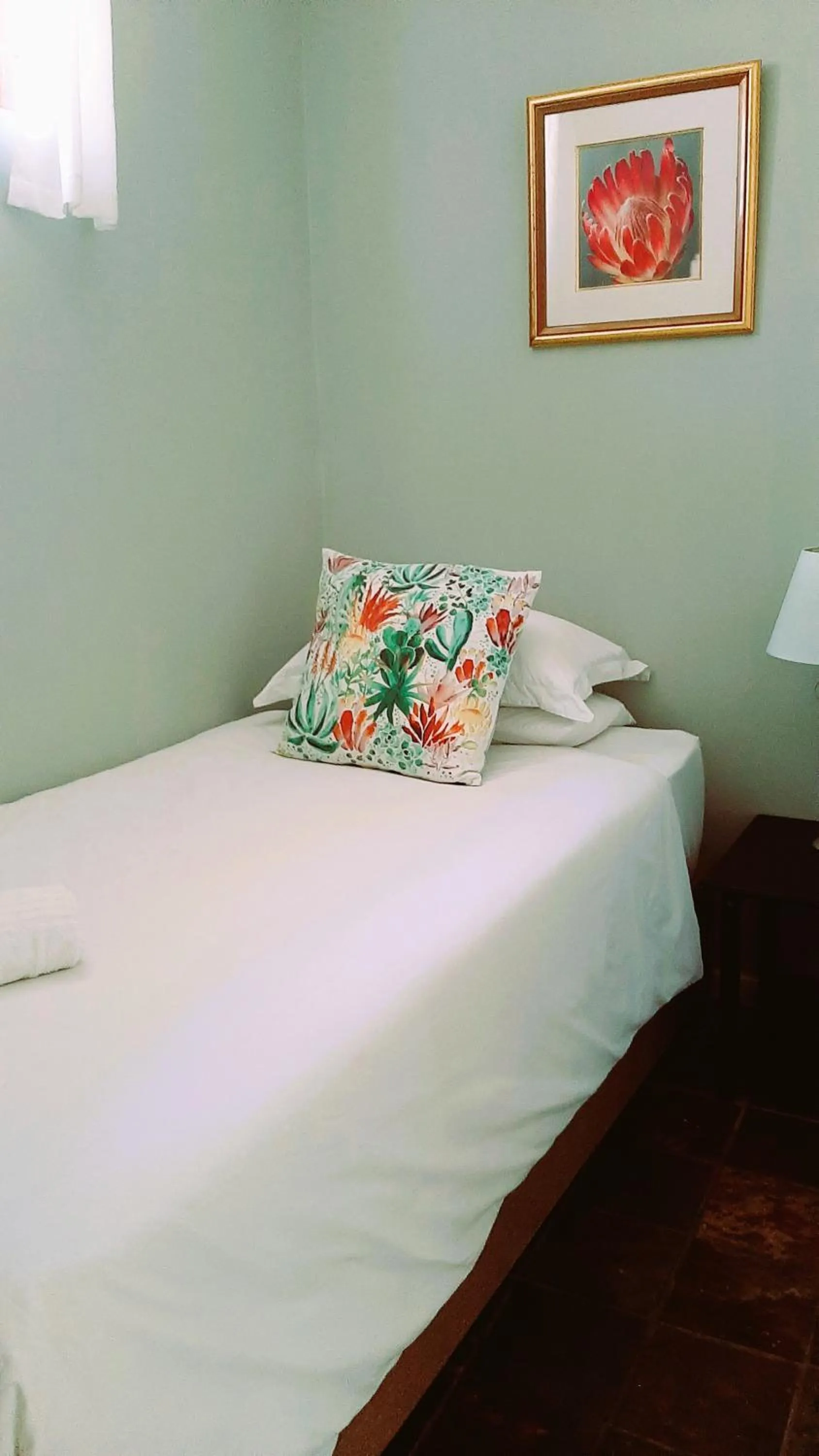 Bed in The Greenhouse Guesthouse