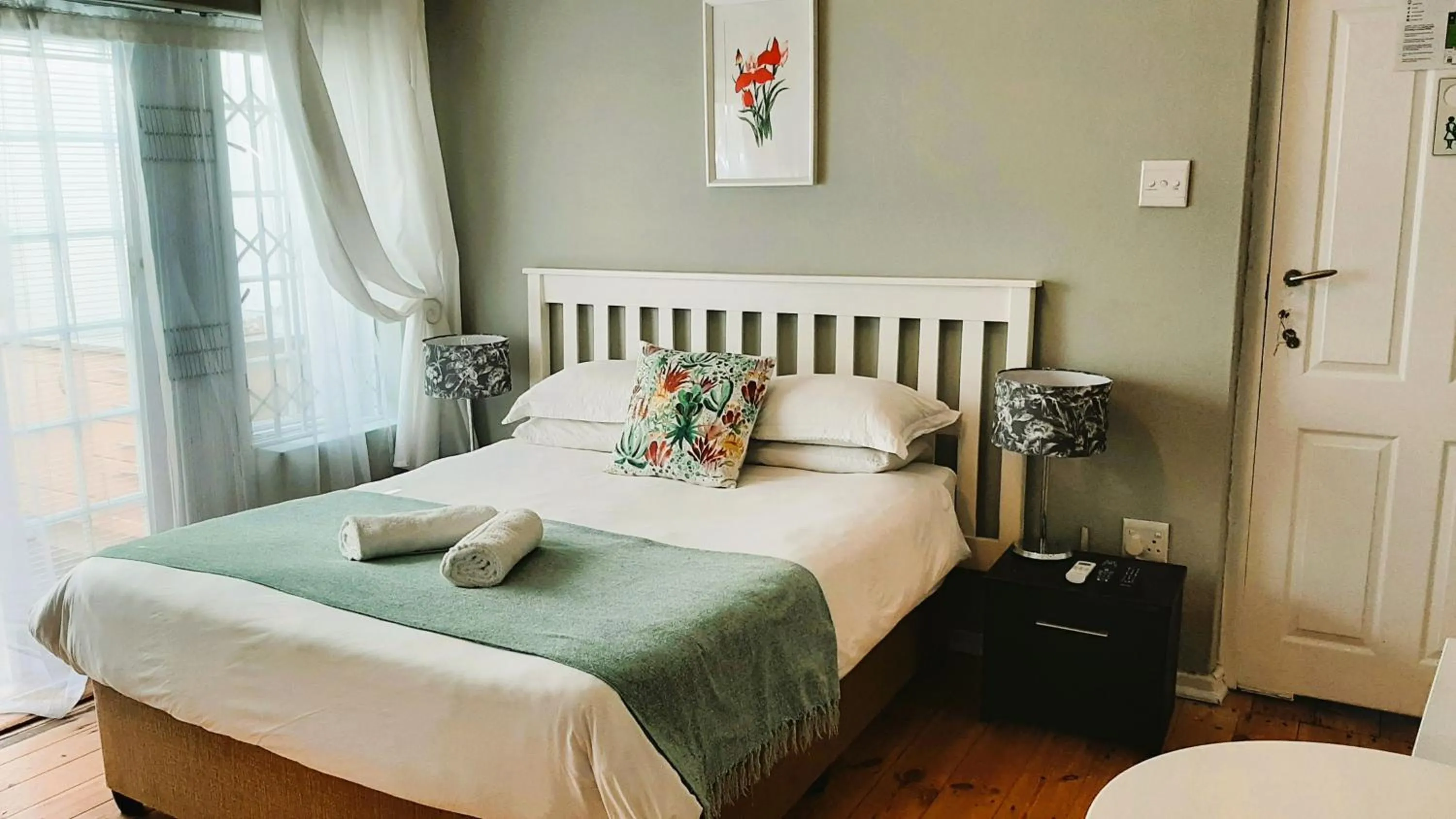 Bed in The Greenhouse Guesthouse