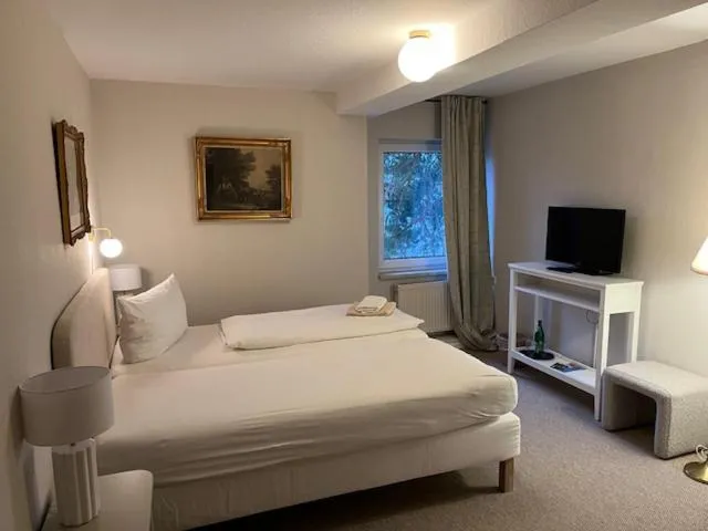 Photo of the whole room, Bed in Hotel & Restaurant Raueneck