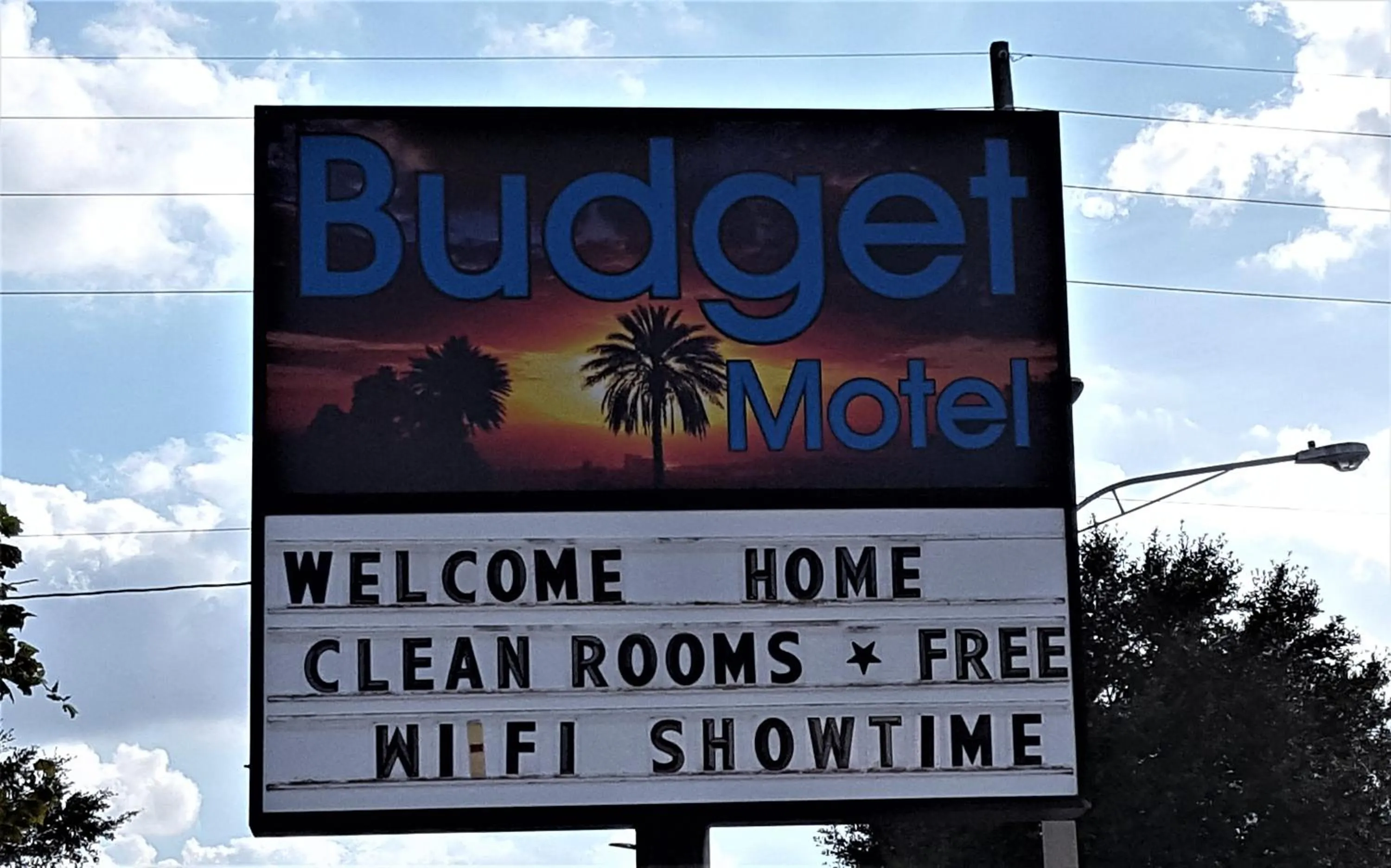 Property logo or sign in Budget Motel
