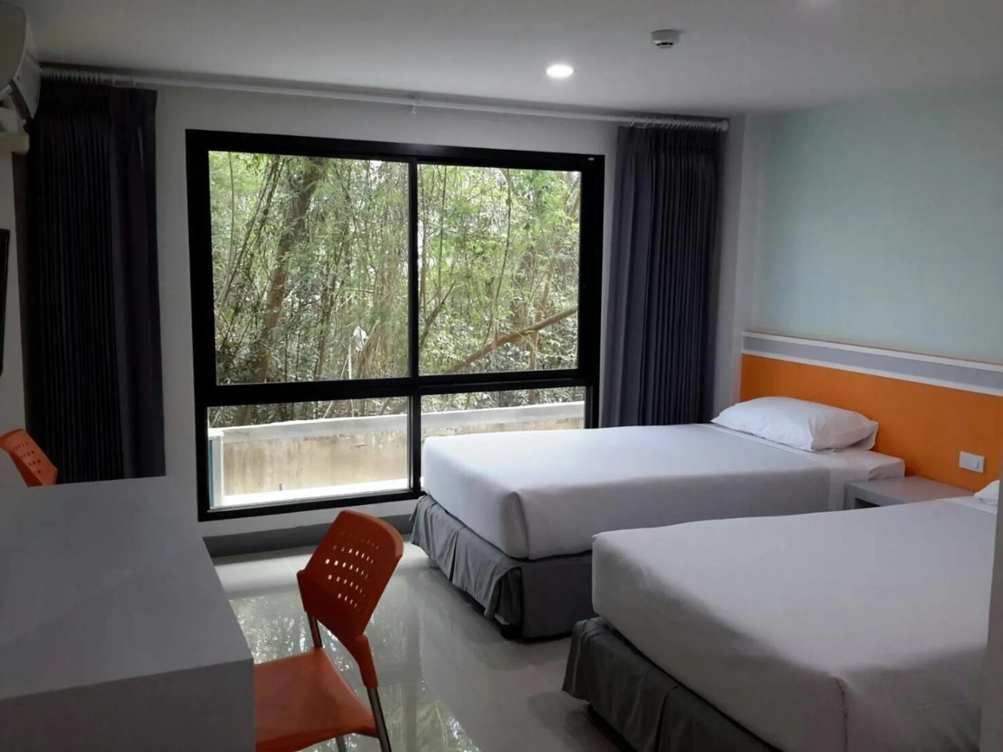 Bed in Sakura Budget Hotel