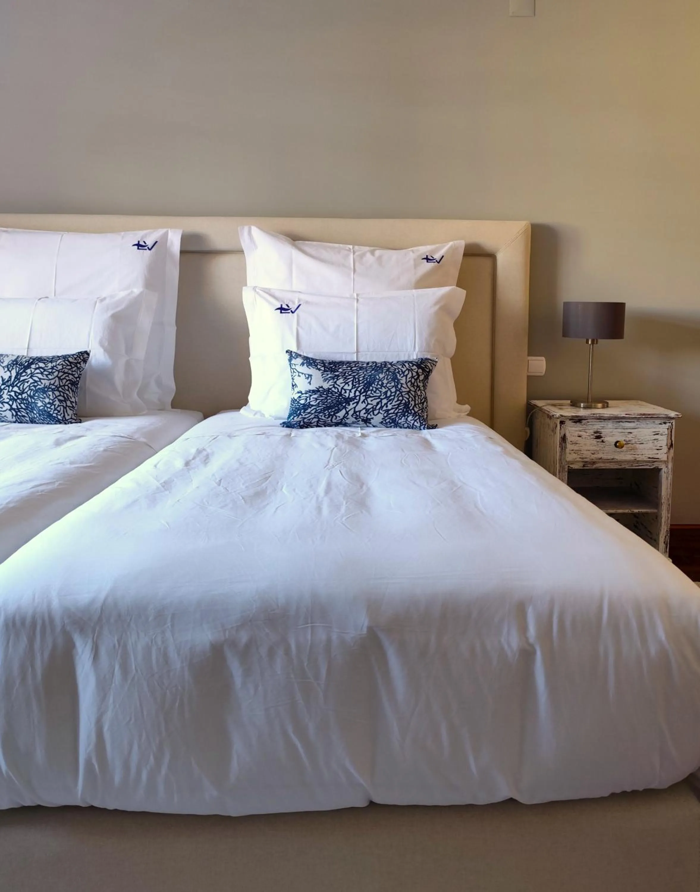Bed in Luso Village Boutique Hotel