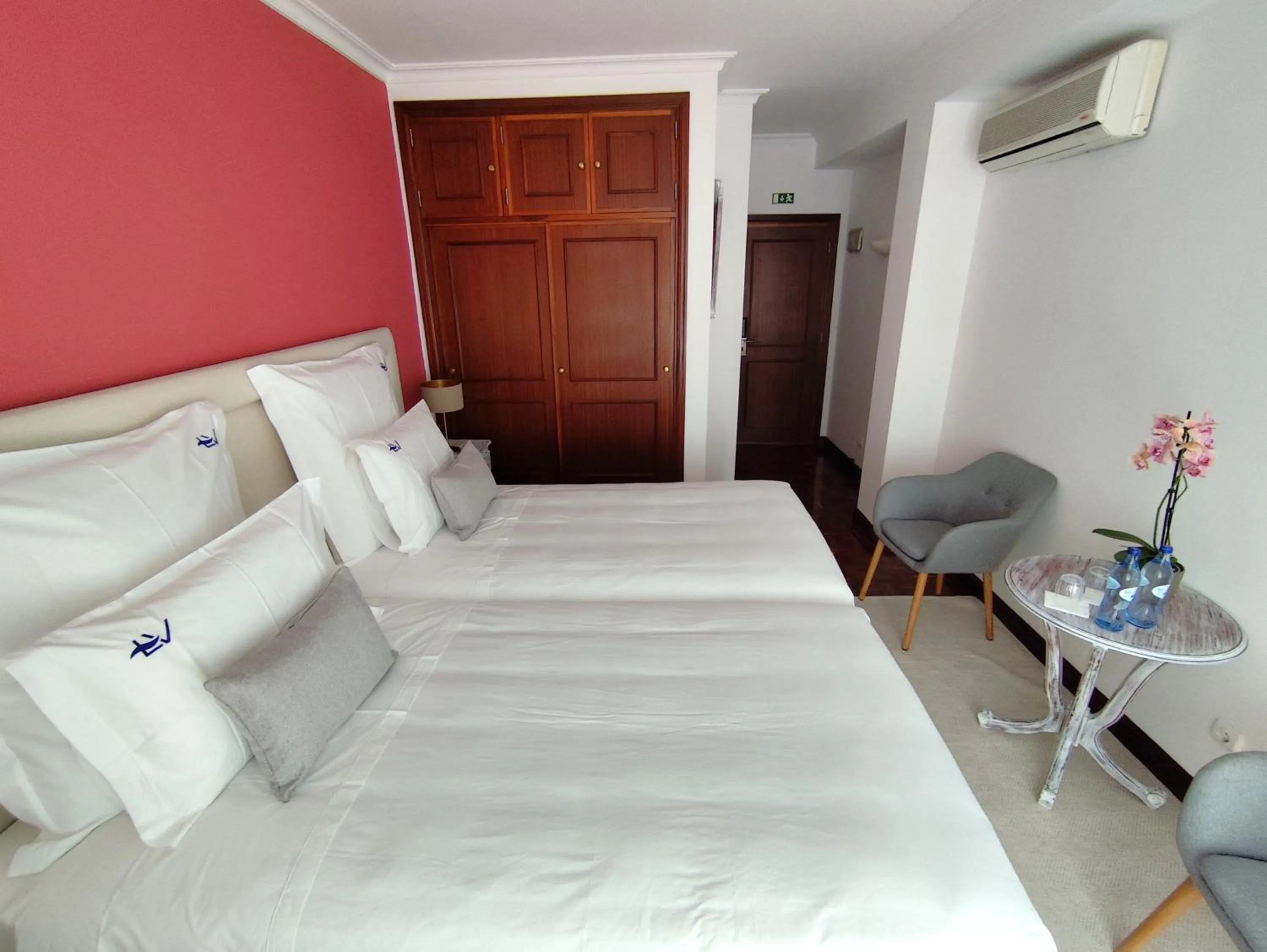 Bed in Luso Village Boutique Hotel