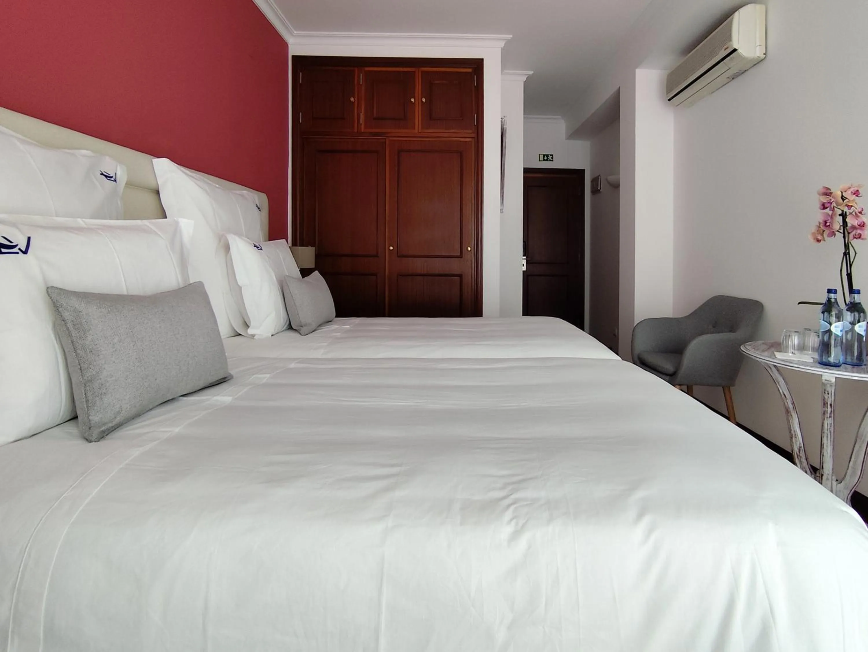 Bed in Luso Village Boutique Hotel