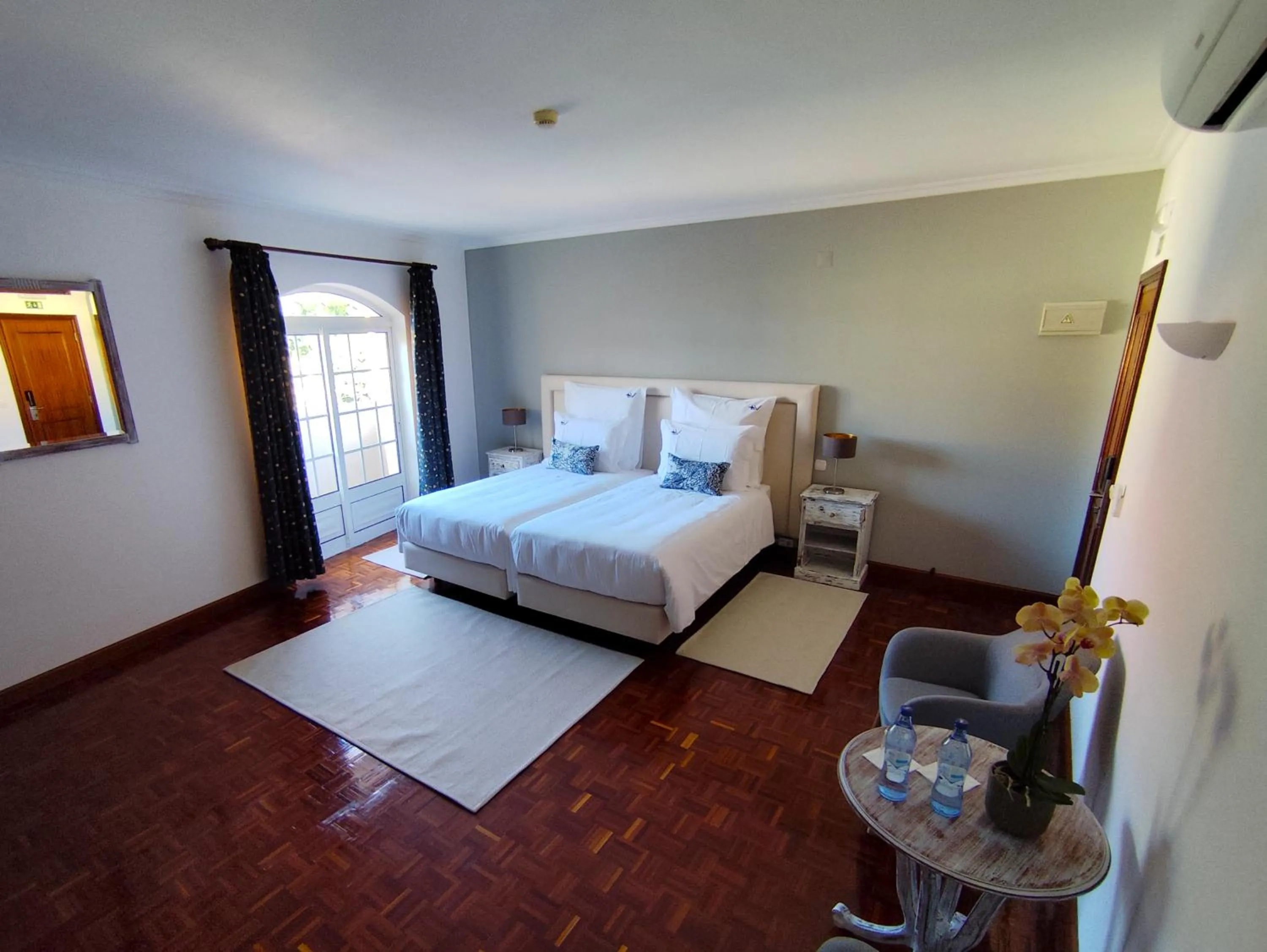 Bed in Luso Village Boutique Hotel