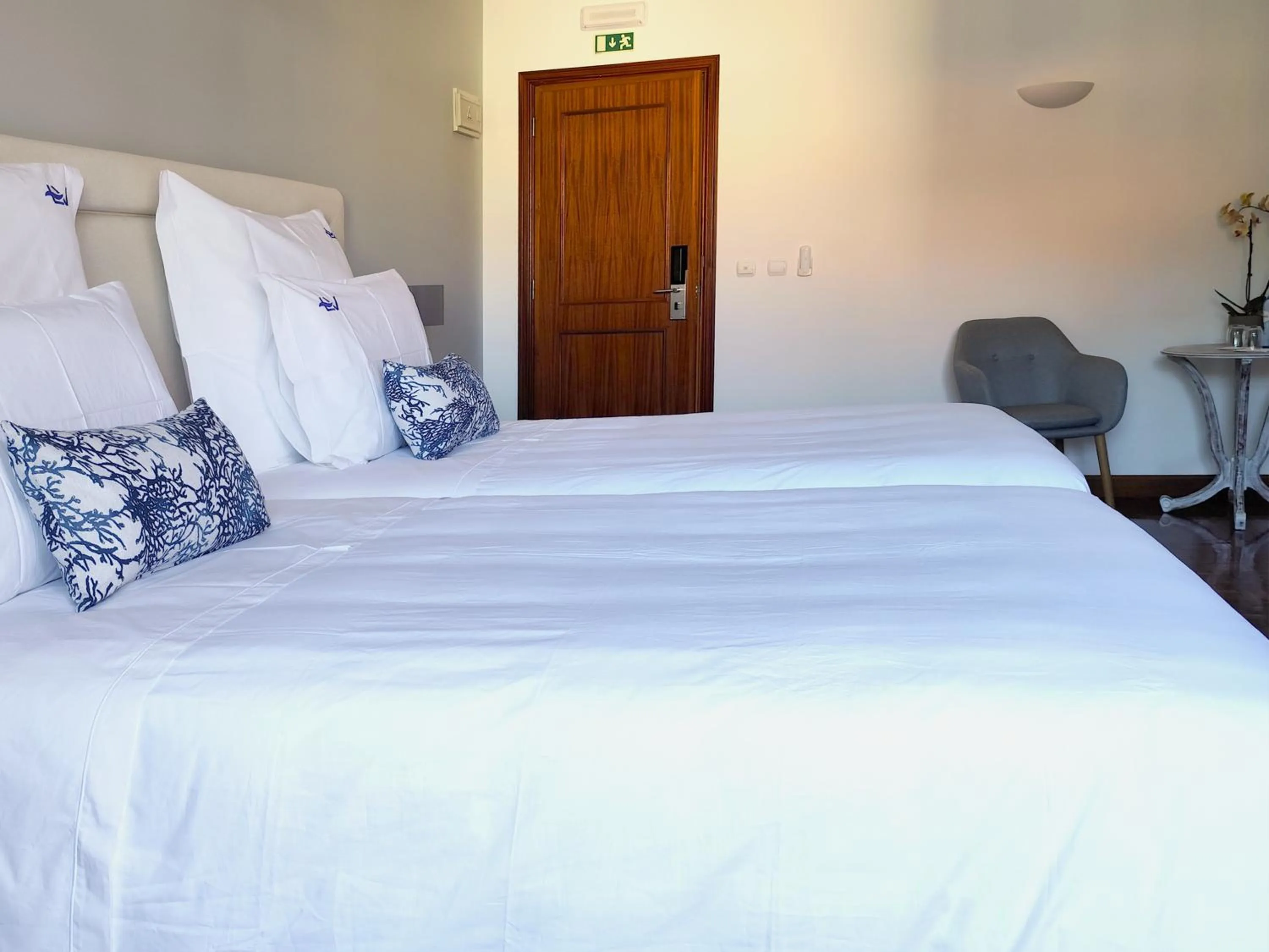 Bed in Luso Village Boutique Hotel