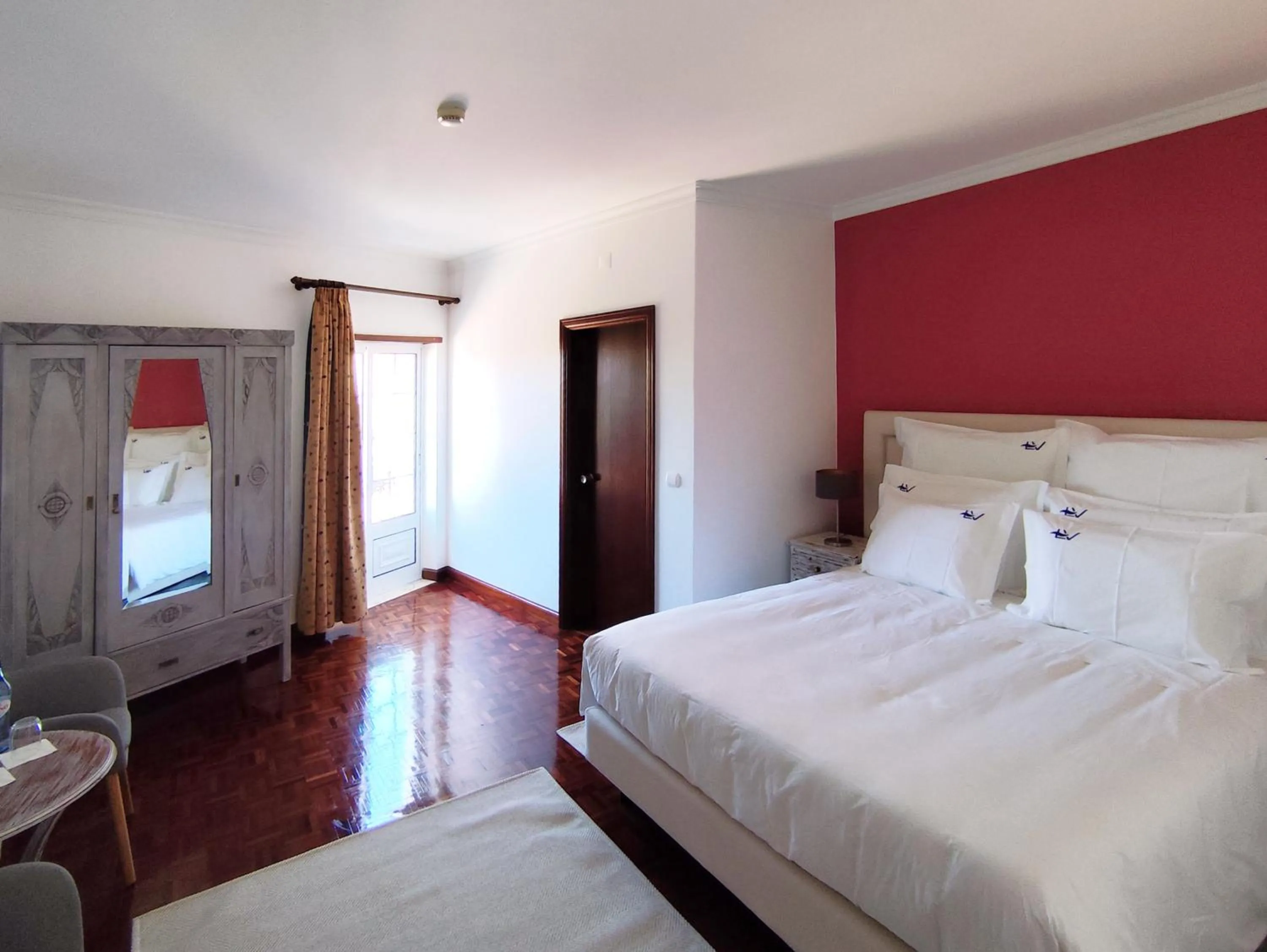 Bed in Luso Village Boutique Hotel