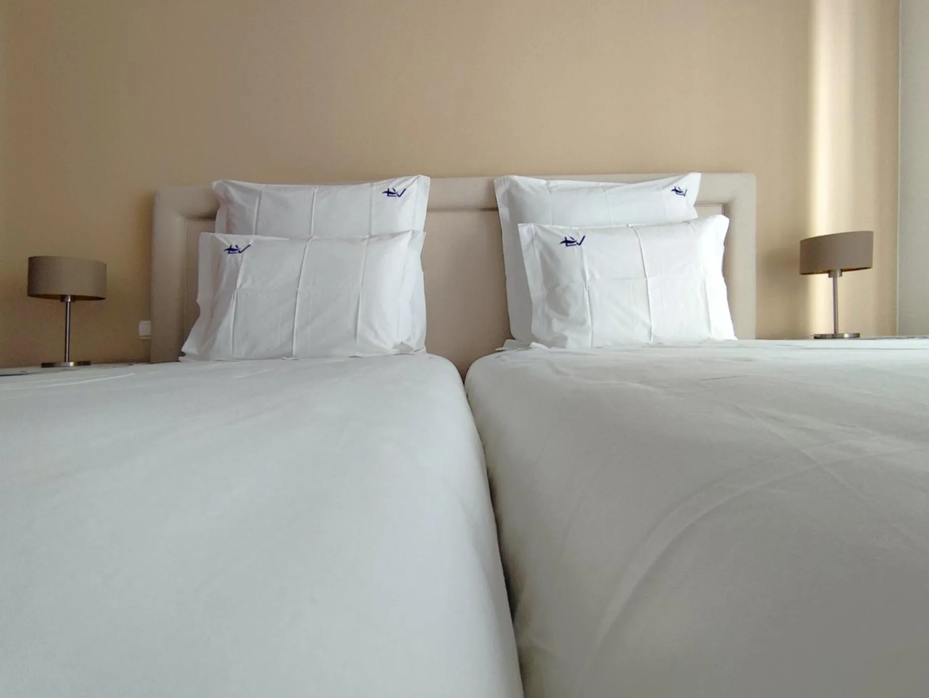 Bed in Luso Village Boutique Hotel