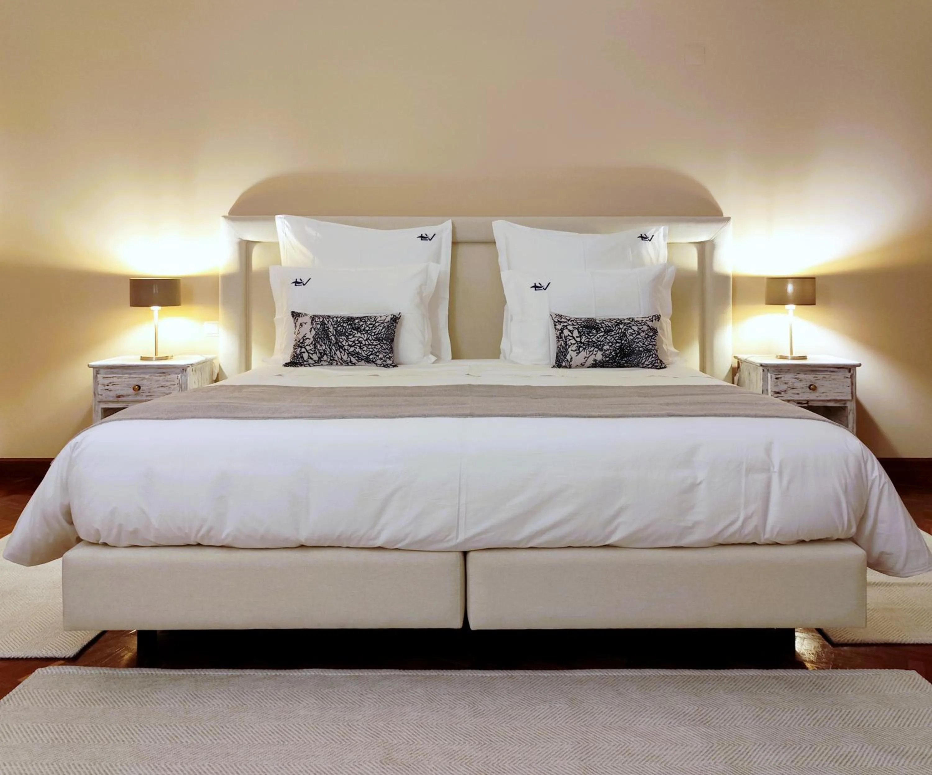 Bed in Luso Village Boutique Hotel