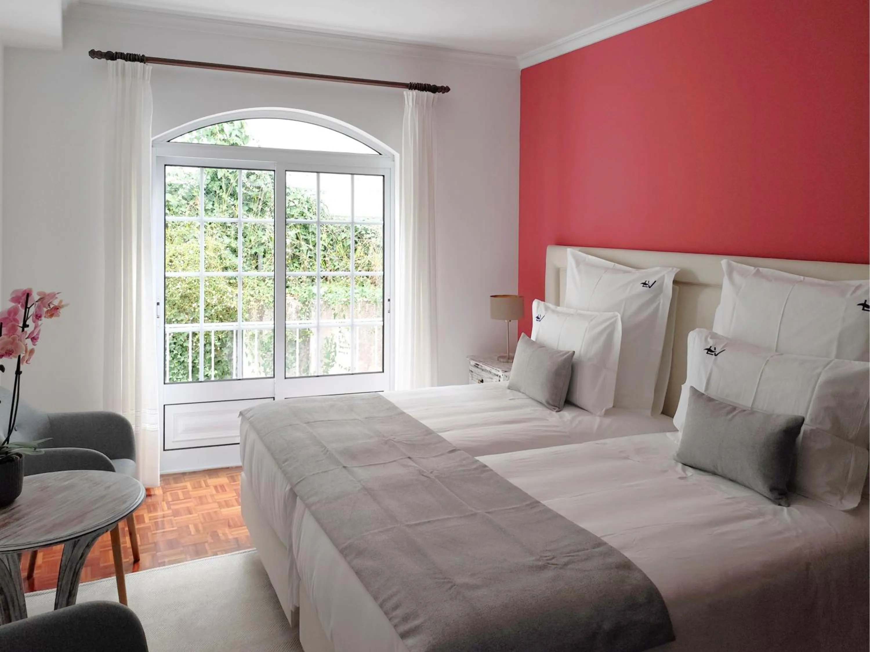 Bed in Luso Village Boutique Hotel