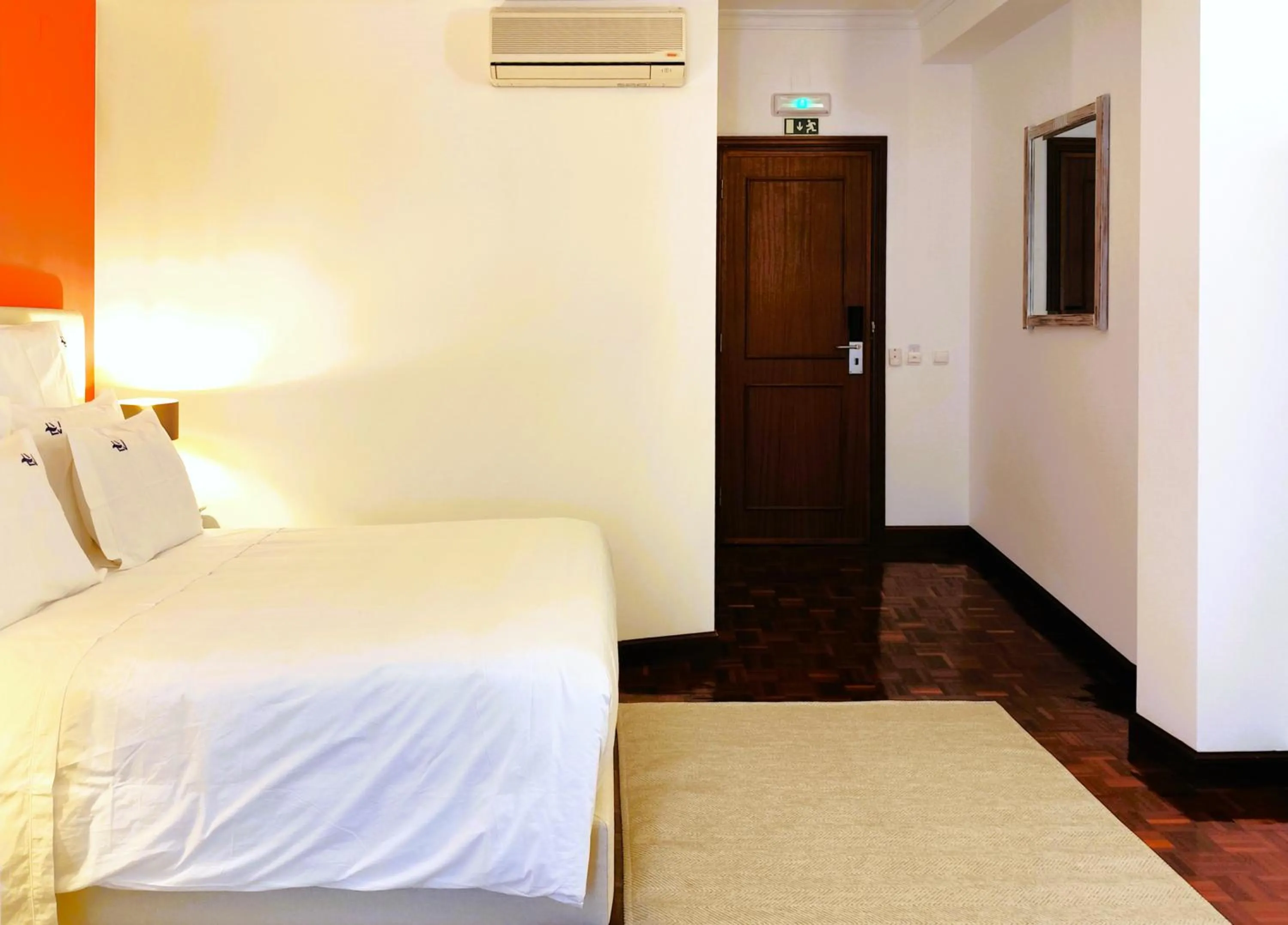 Bed in Luso Village Boutique Hotel