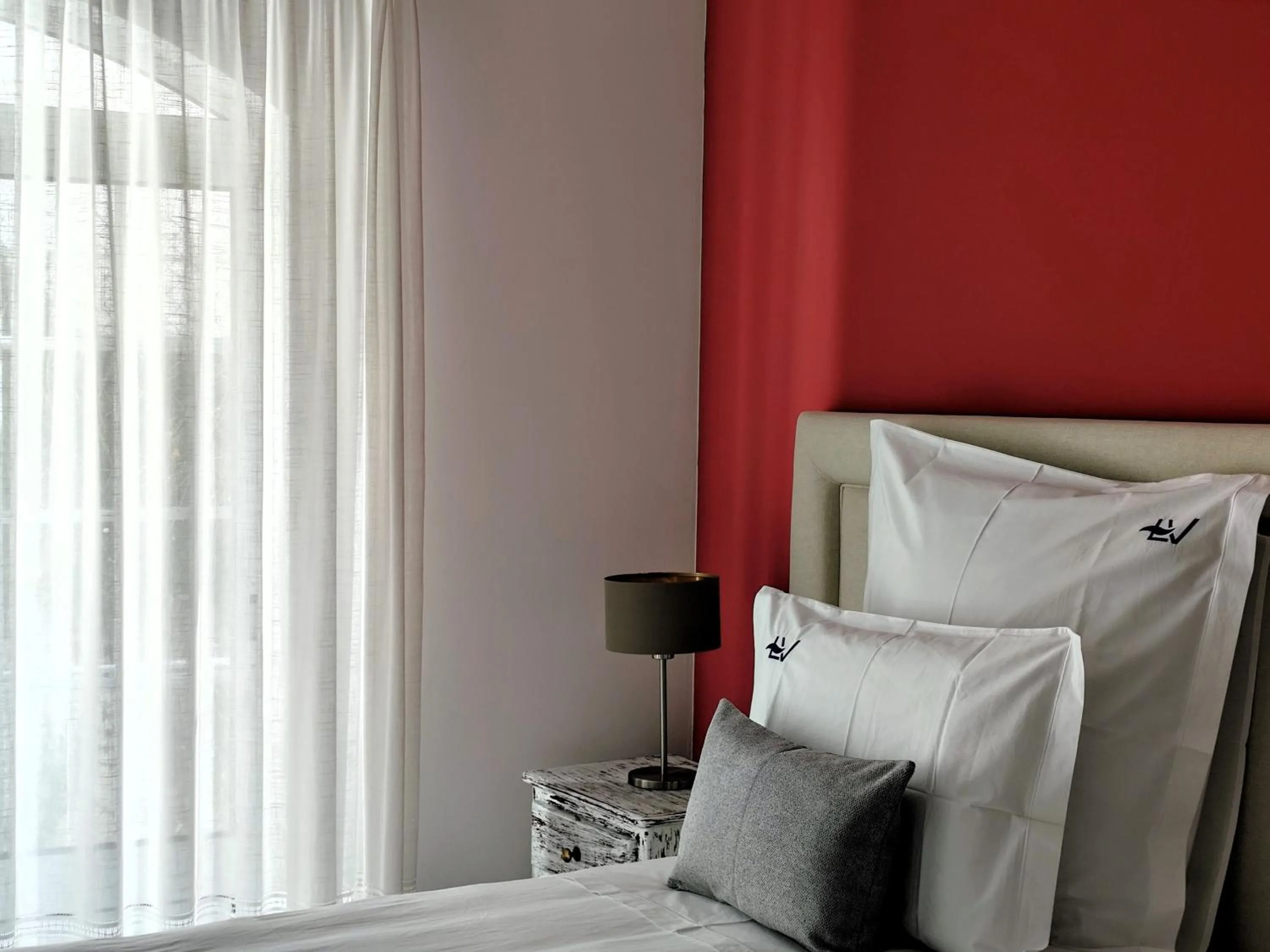 Bed in Luso Village Boutique Hotel