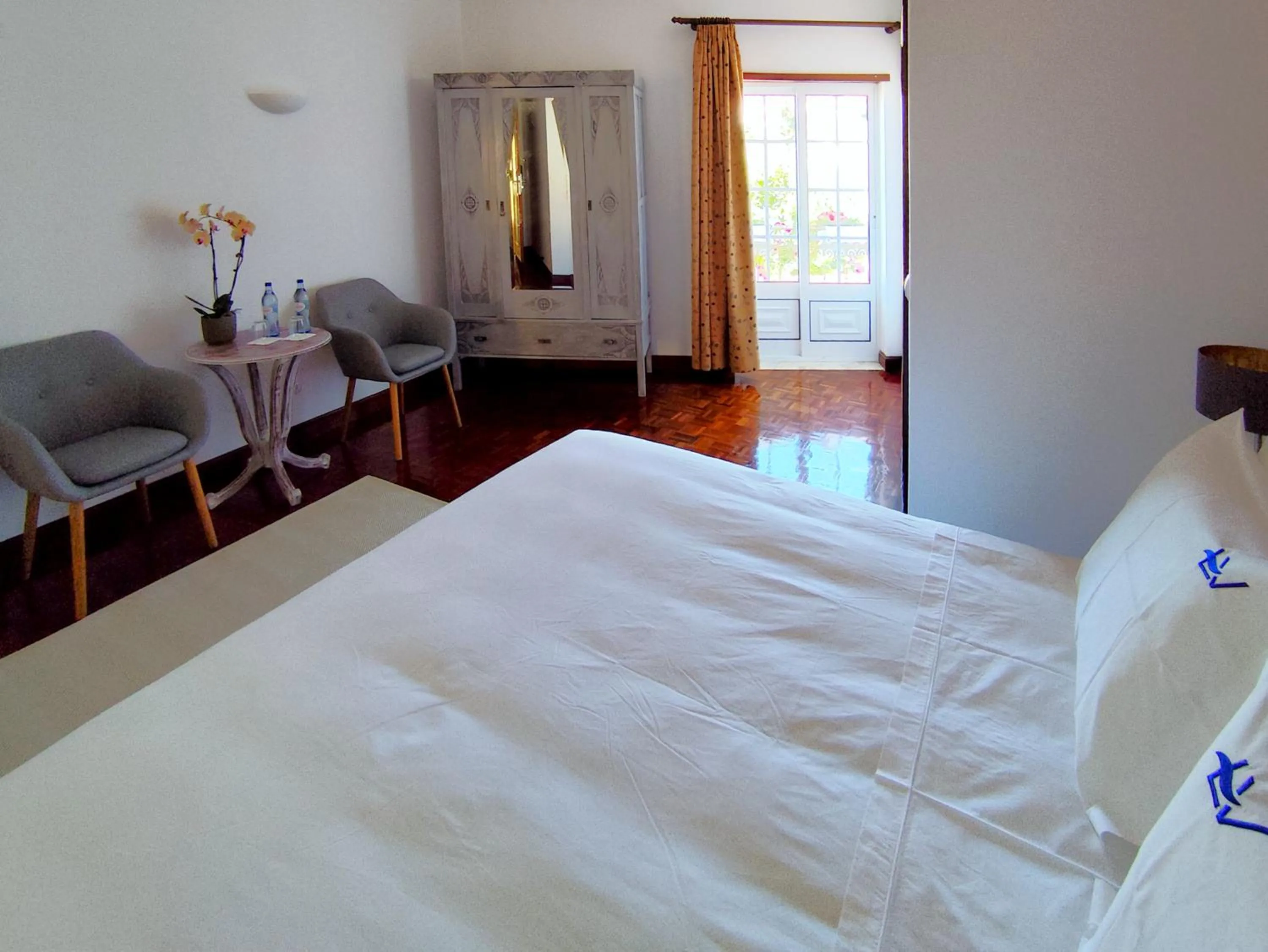 Bed in Luso Village Boutique Hotel
