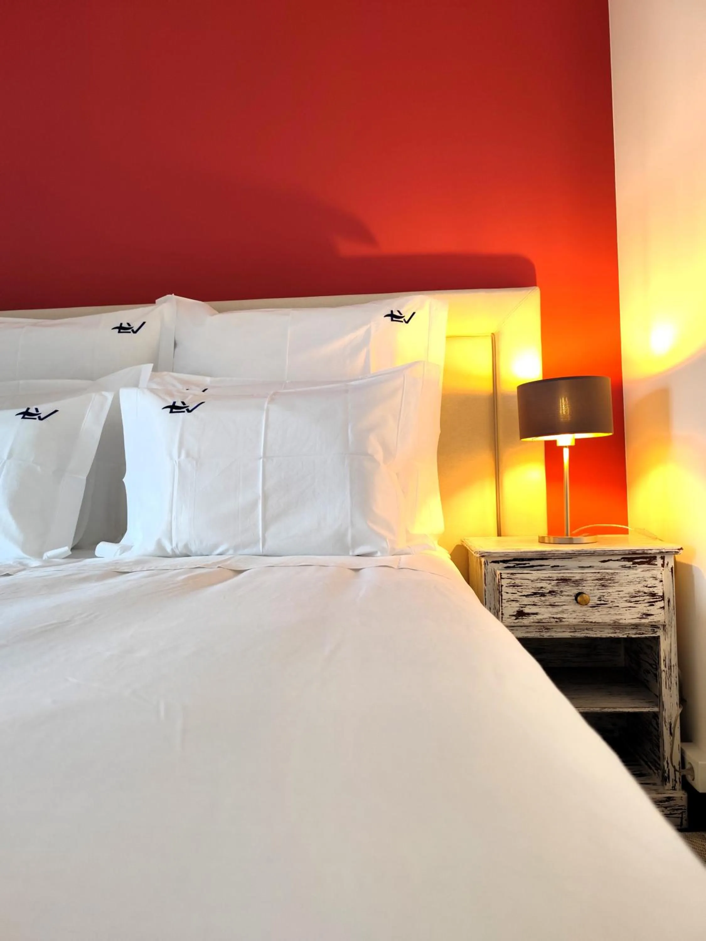 Bed in Luso Village Boutique Hotel