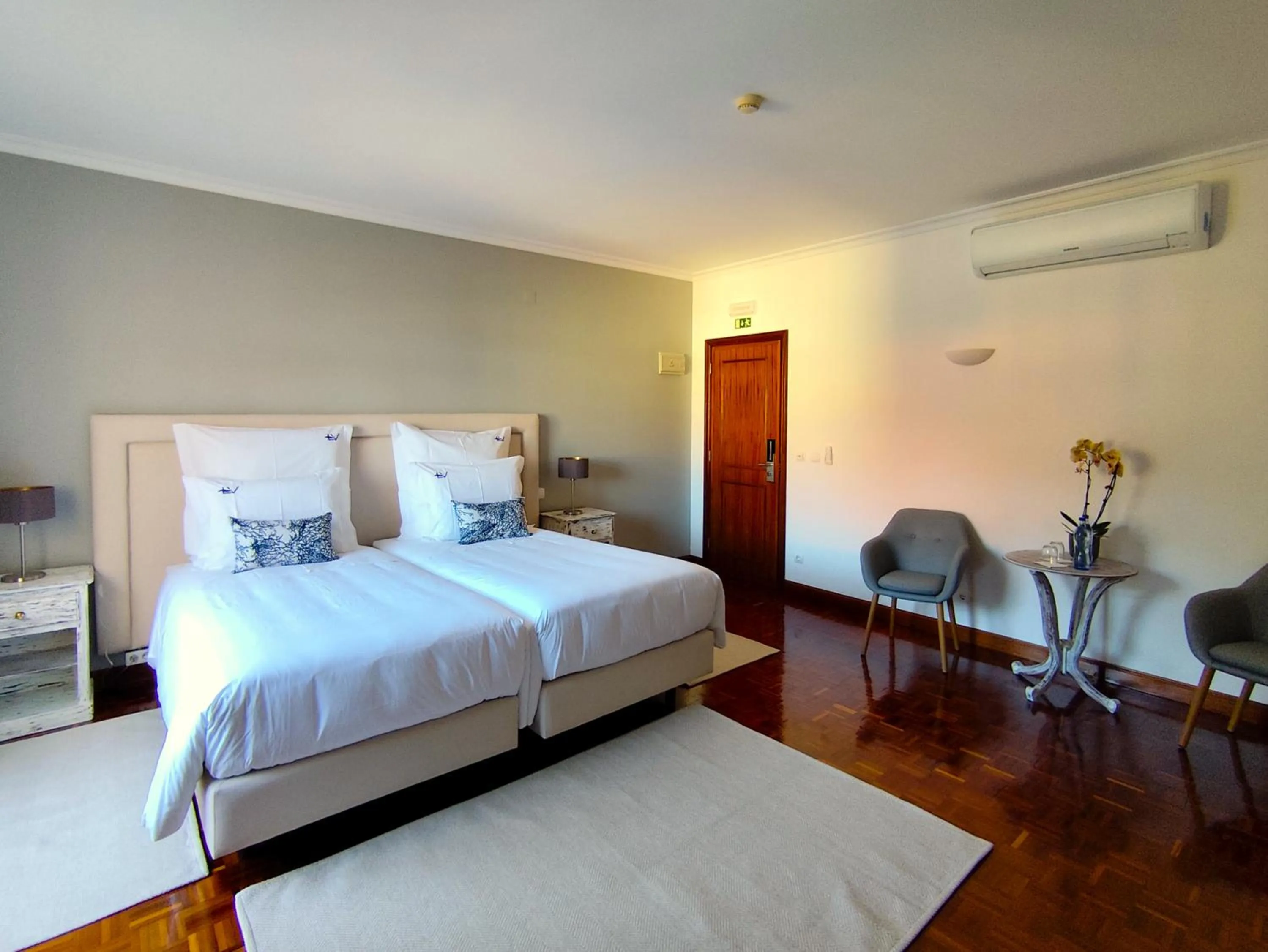 Bed in Luso Village Boutique Hotel