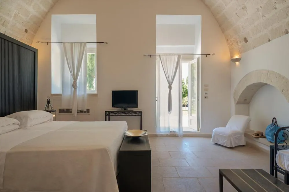 Photo of the whole room, Bed in Masseria Montelauro