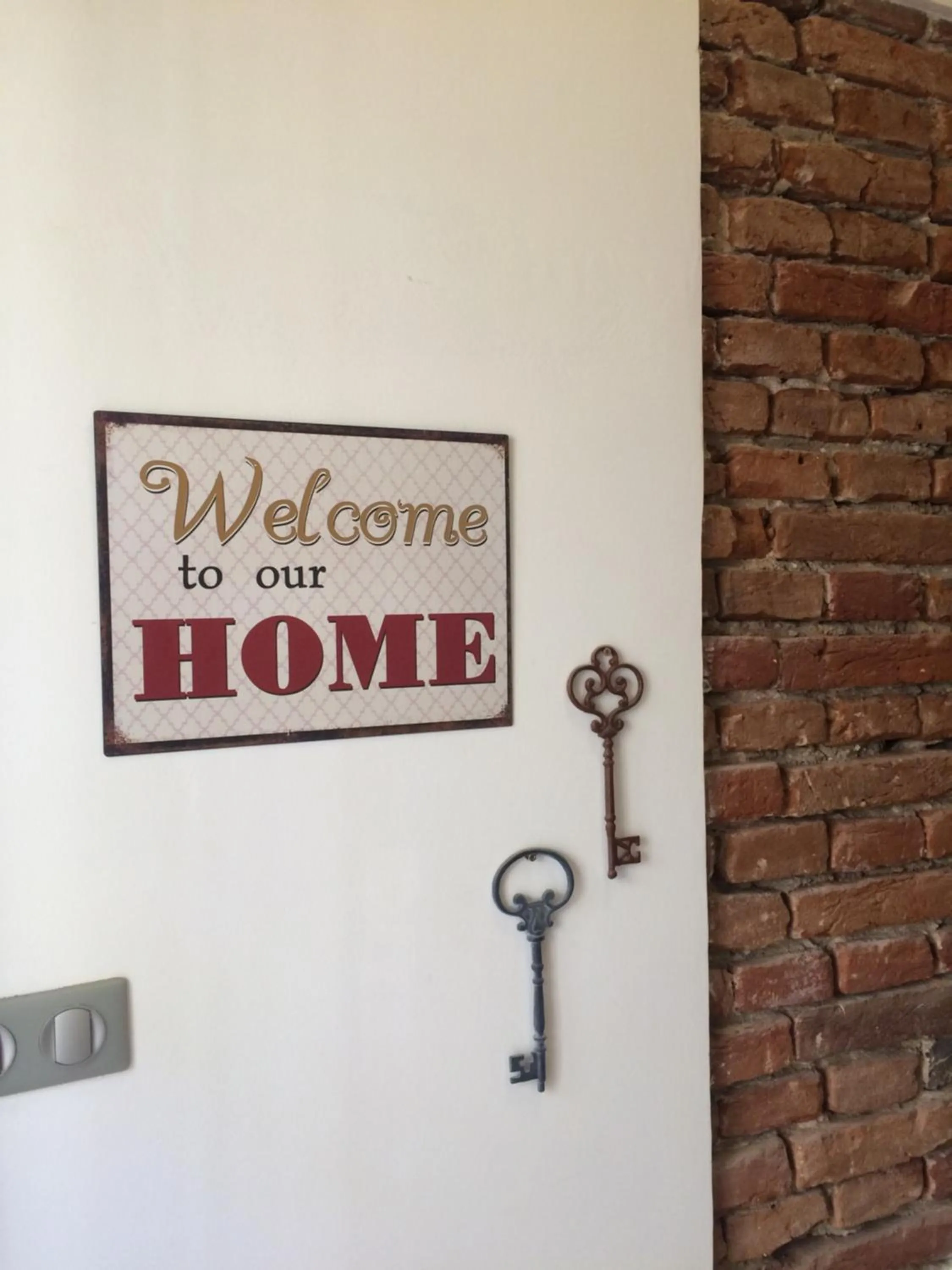 Property logo or sign in Pinkova Apartments