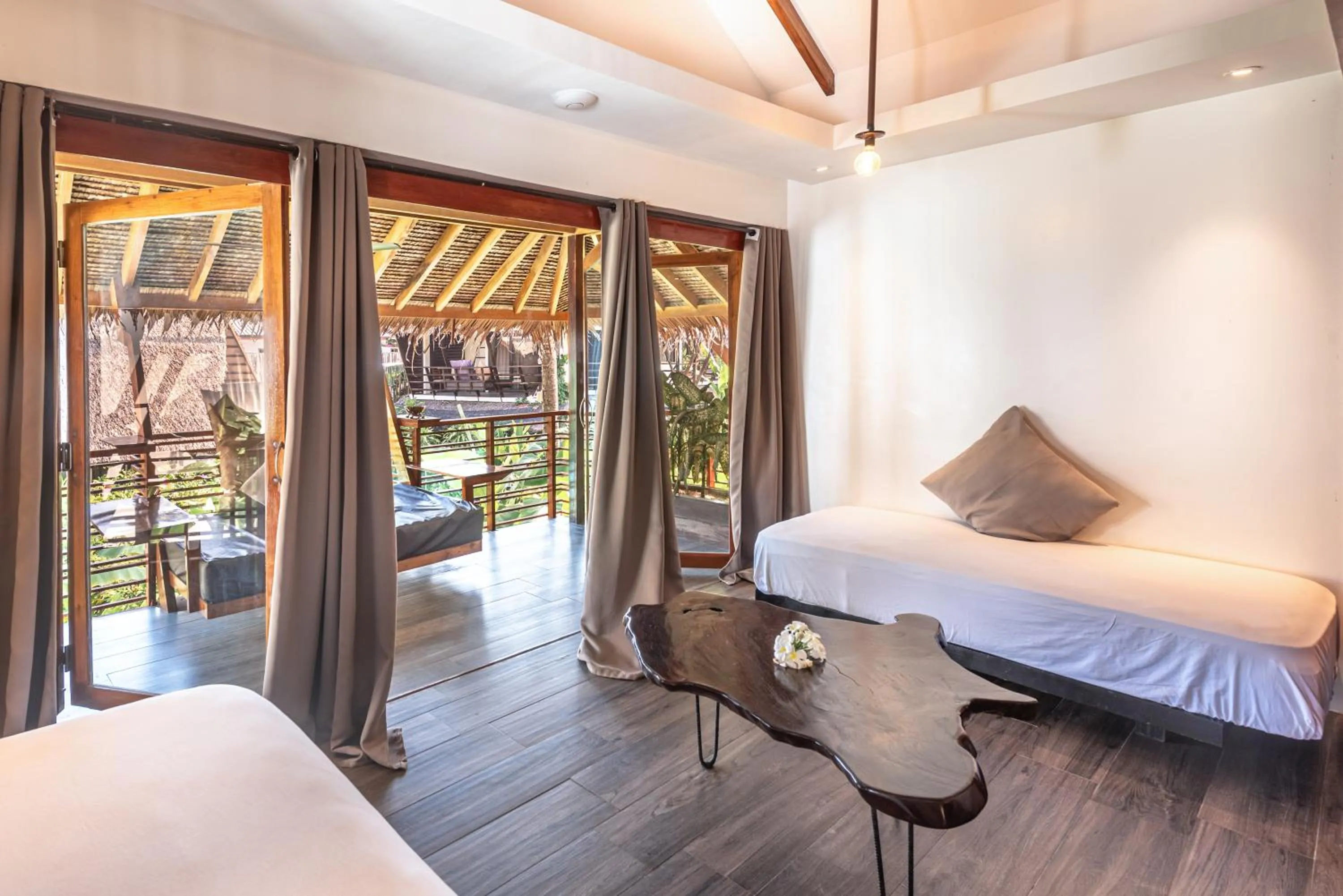 Bed in Siargao Island Villas